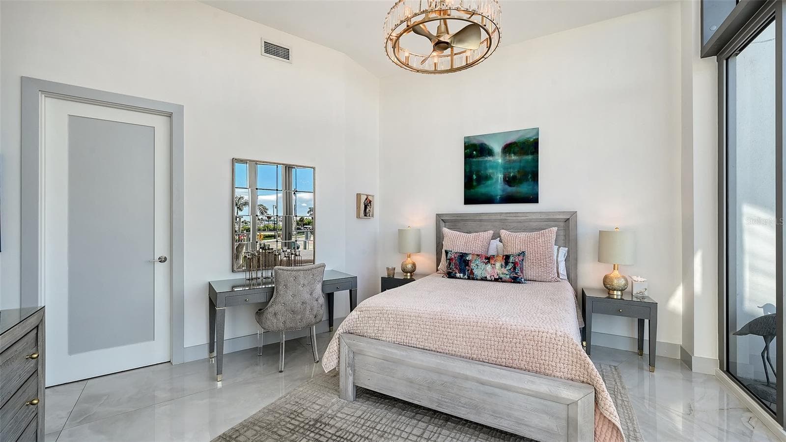 The primary suite offers a spacious design inspiring relaxation and comfort. - 1155 N GULFSTREAM AVE #207, SARASOTA