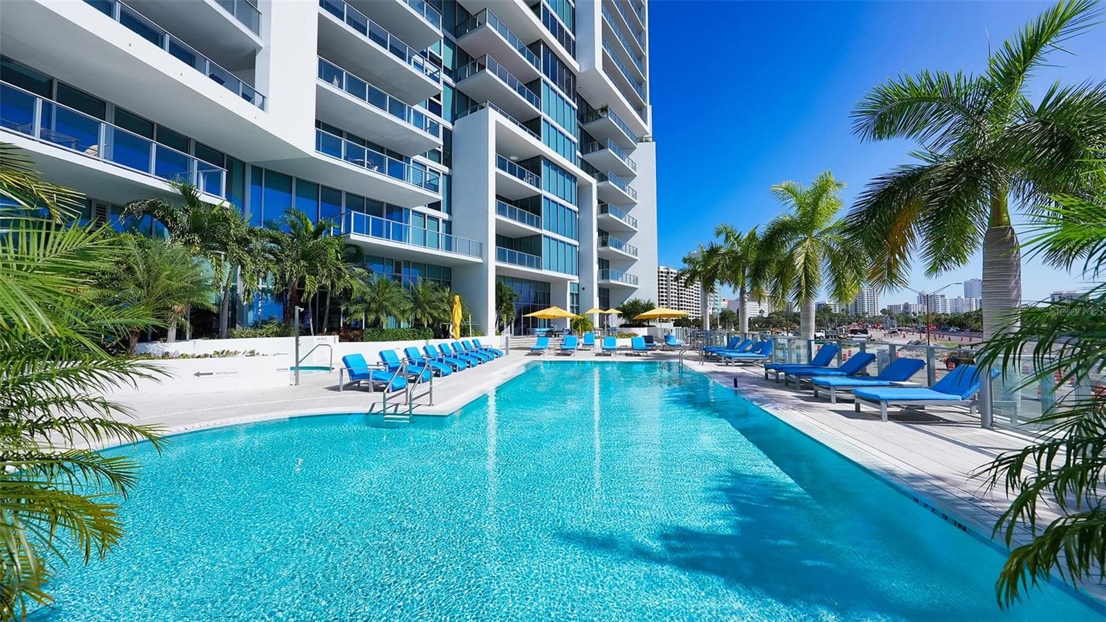 Enjoy the luxury of a large, heated saltwater pool reserved exclusively for residents, perfect for year-round relaxation and recreation. - 1155 N GULFSTREAM AVE #207, SARASOTA