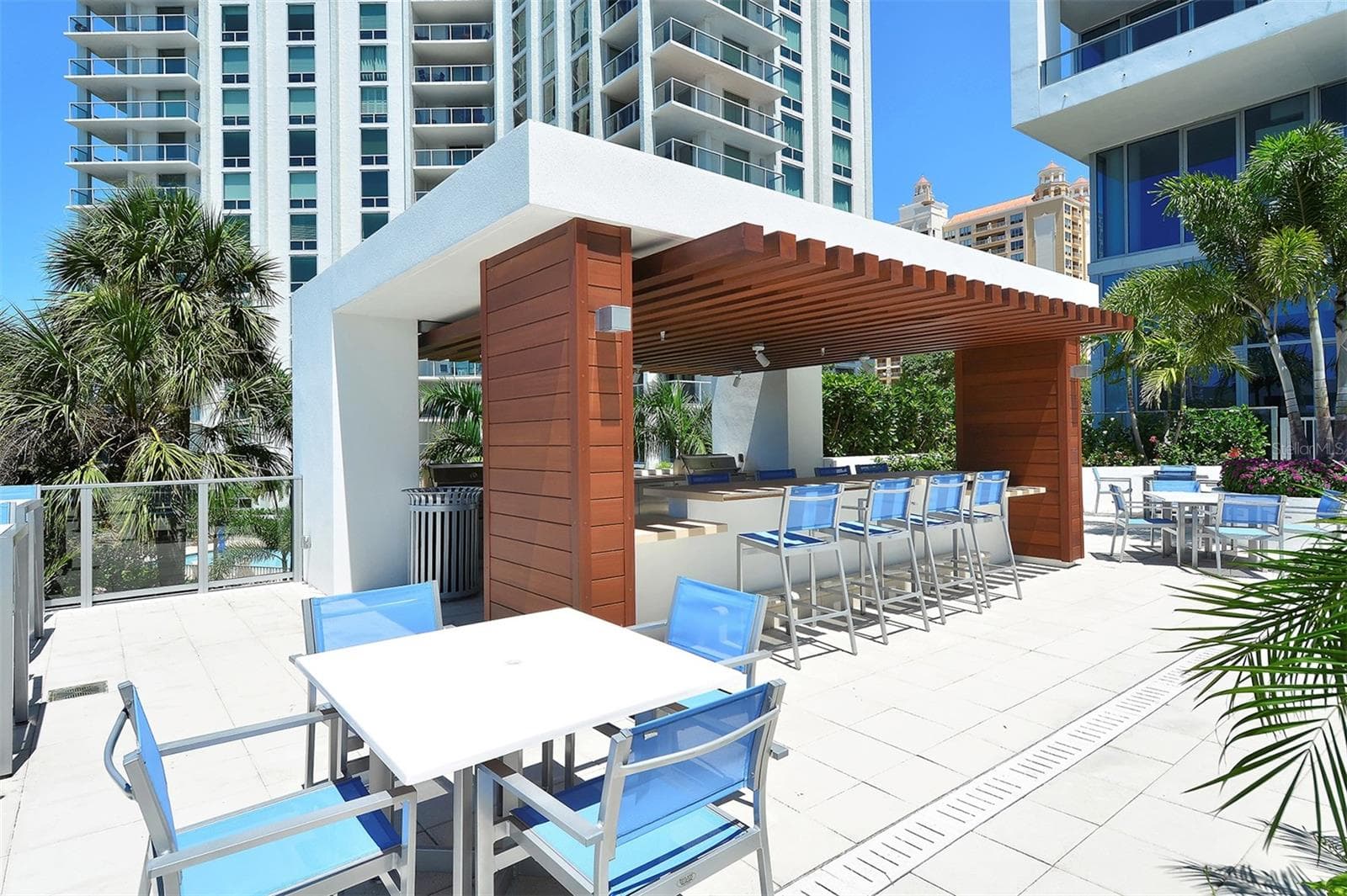 Abundant outdoor gathering spaces for al fresco dining, entertaining, and connecting with friends. - 1155 N GULFSTREAM AVE #207, SARASOTA
