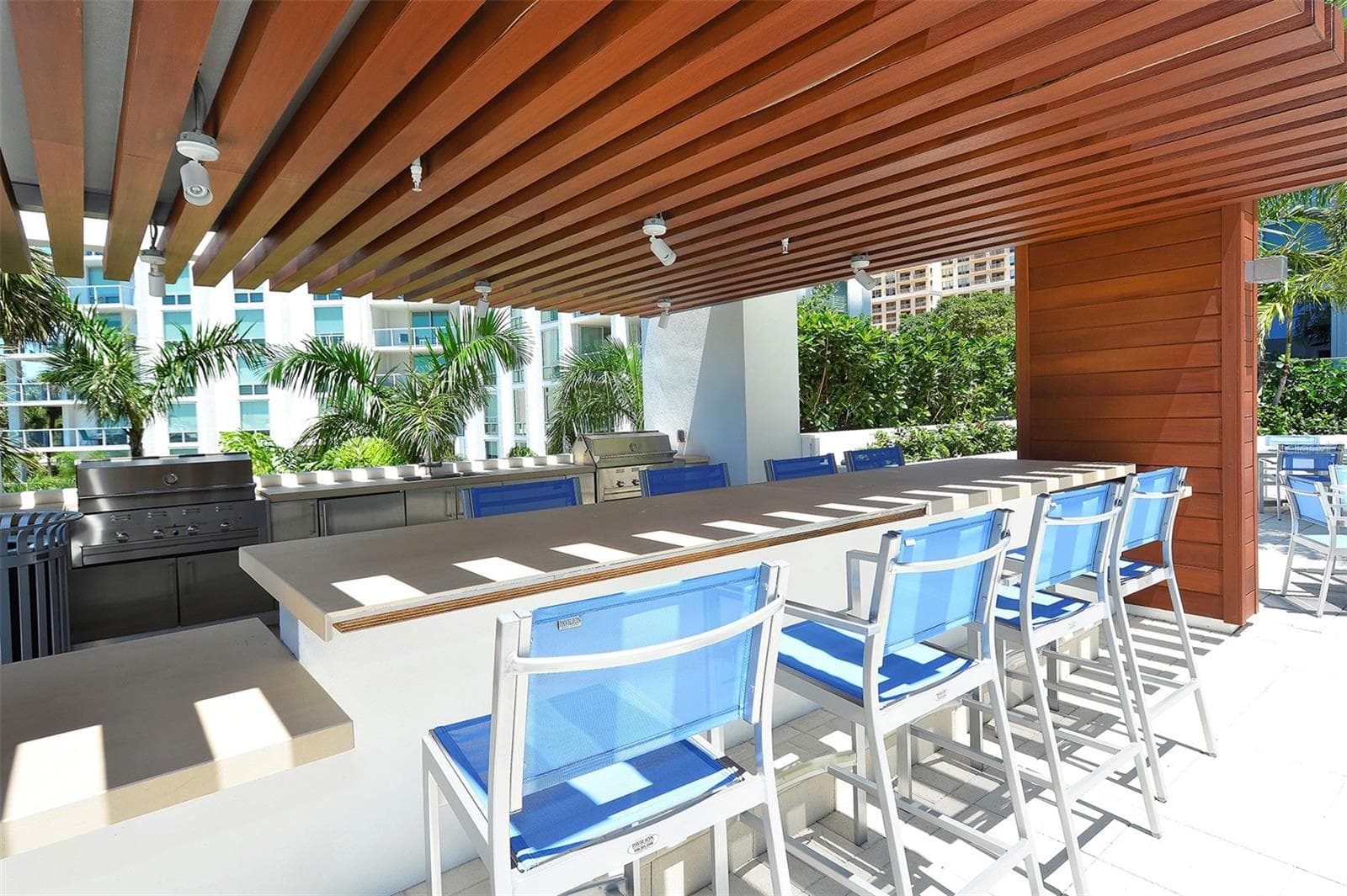 Enjoy the resident grilling area, perfect for casual outdoor dining, entertaining, and gathering with friends and family. - 1155 N GULFSTREAM AVE #207, SARASOTA