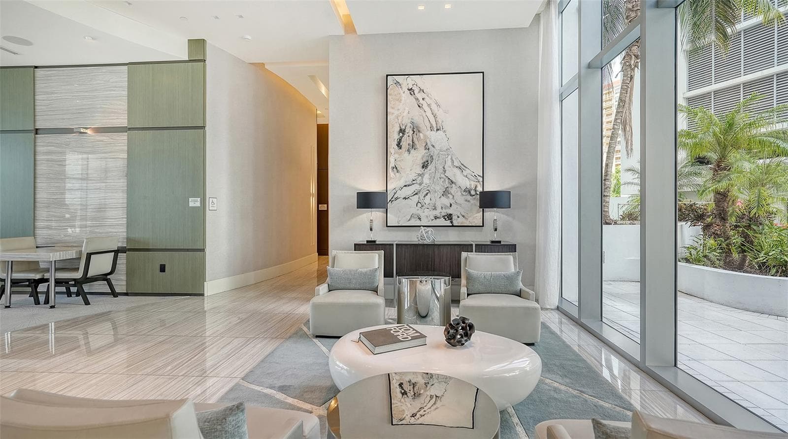 An exquisite lobby showcasing sophisticated design, luxurious finishes, and timeless elegance. - 1155 N GULFSTREAM AVE #207, SARASOTA