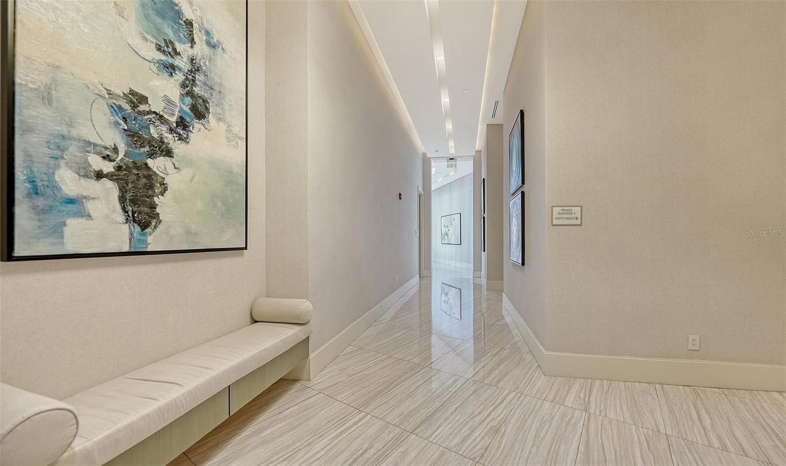 Elegant lobby-level living offers refined comfort, inviting gathering spaces, and effortless everyday convenience. - 1155 N GULFSTREAM AVE #207, SARASOTA