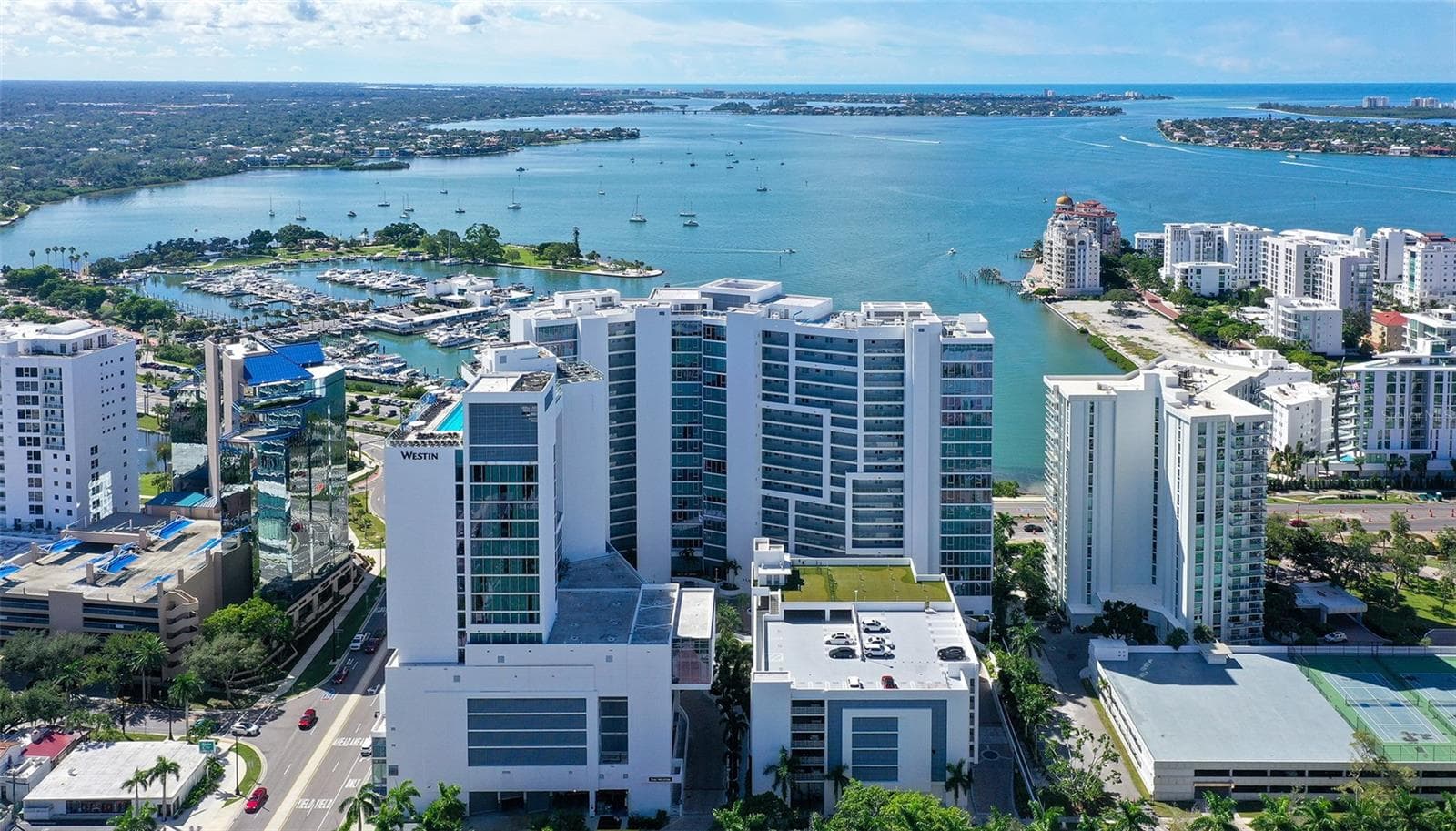 Aerial views showcase The VUE’s premier downtown Sarasota location, ideally positioned along the waterfront with spectacular views of Sarasota Bay. - 1155 N GULFSTREAM AVE #207, SARASOTA
