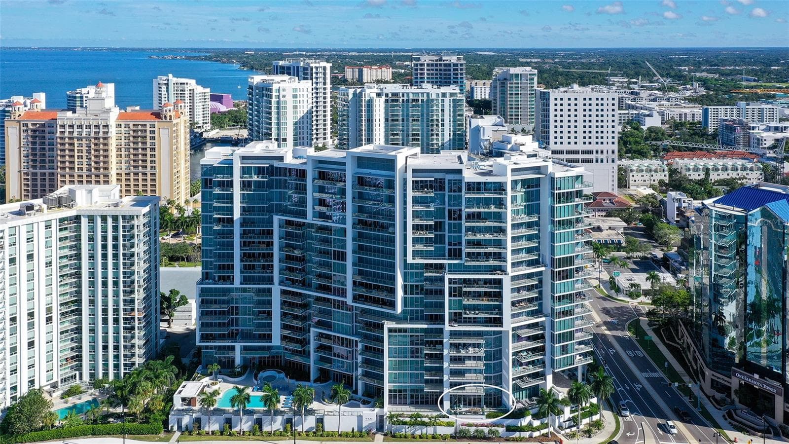 One of only four oversized private waterfront balconies at The VUE, offering an exceptional setting for outdoor living and breathtaking bay views. - 1155 N GULFSTREAM AVE #207, SARASOTA
