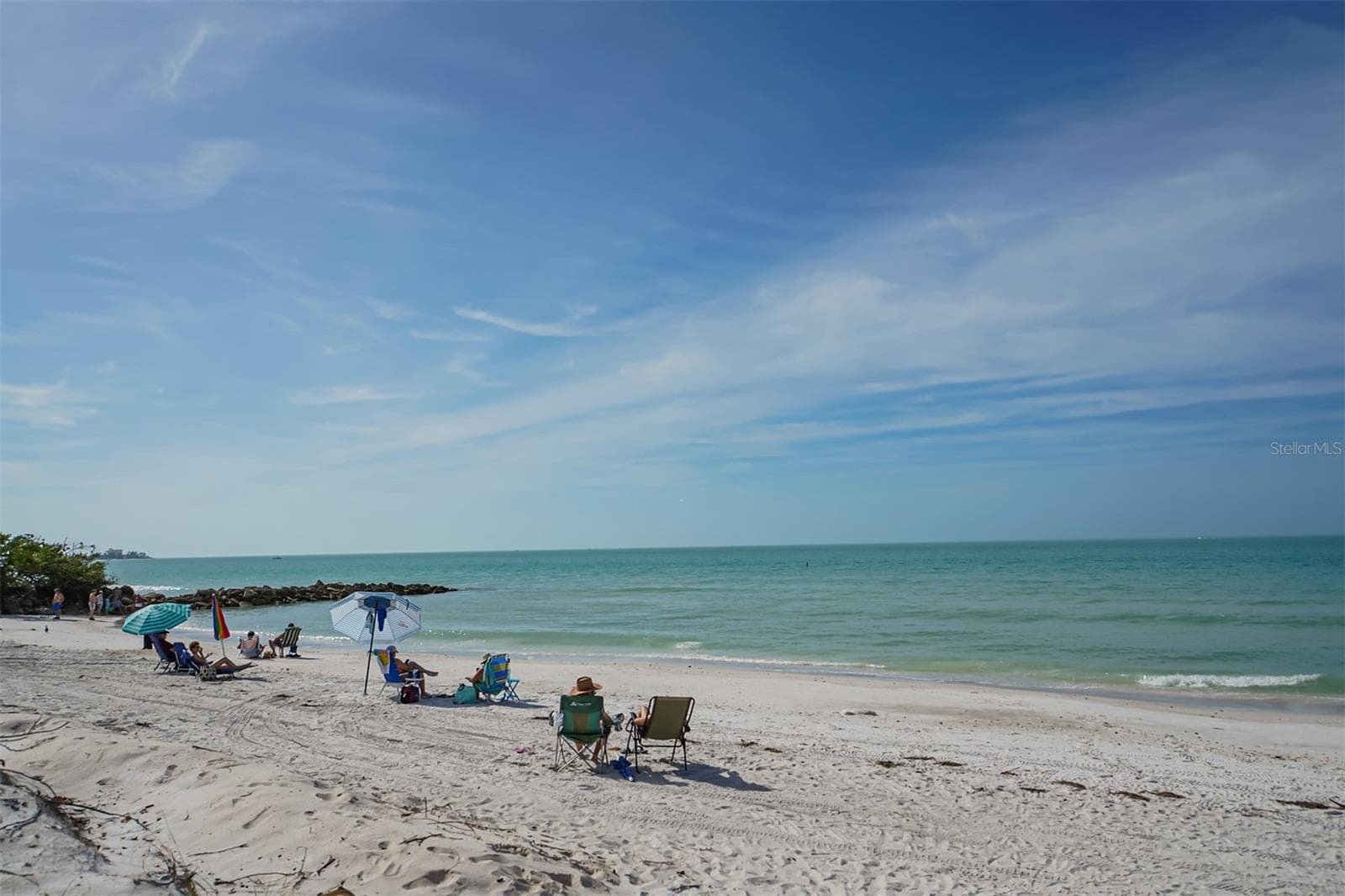 Settle into your beach chair on the pristine white sands of Lido Beach and enjoy the serenity. - 1155 N GULFSTREAM AVE #207, SARASOTA