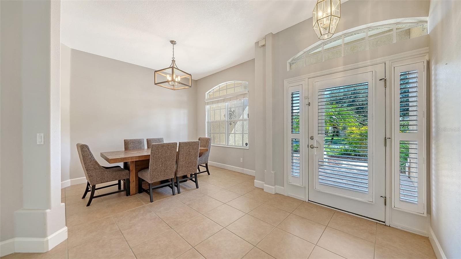 Foyer and formal dining room - 819 GOLDEN POND CT, OSPREY