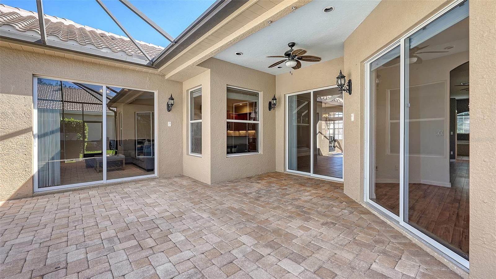 Covered porch space - 819 GOLDEN POND CT, OSPREY