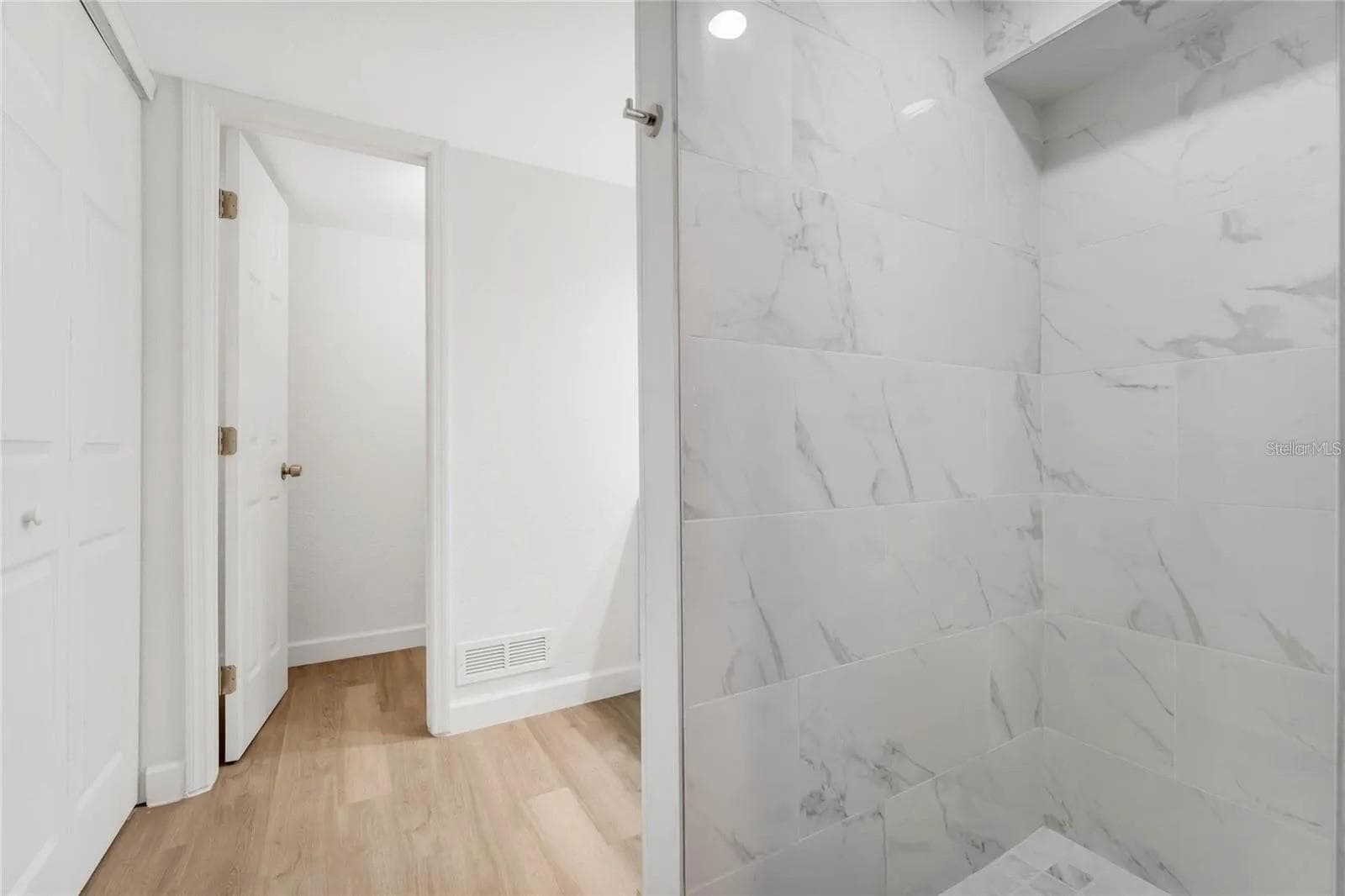 Primary bathroom shower. - 438 VIRGINIA AVE, ST CLOUD