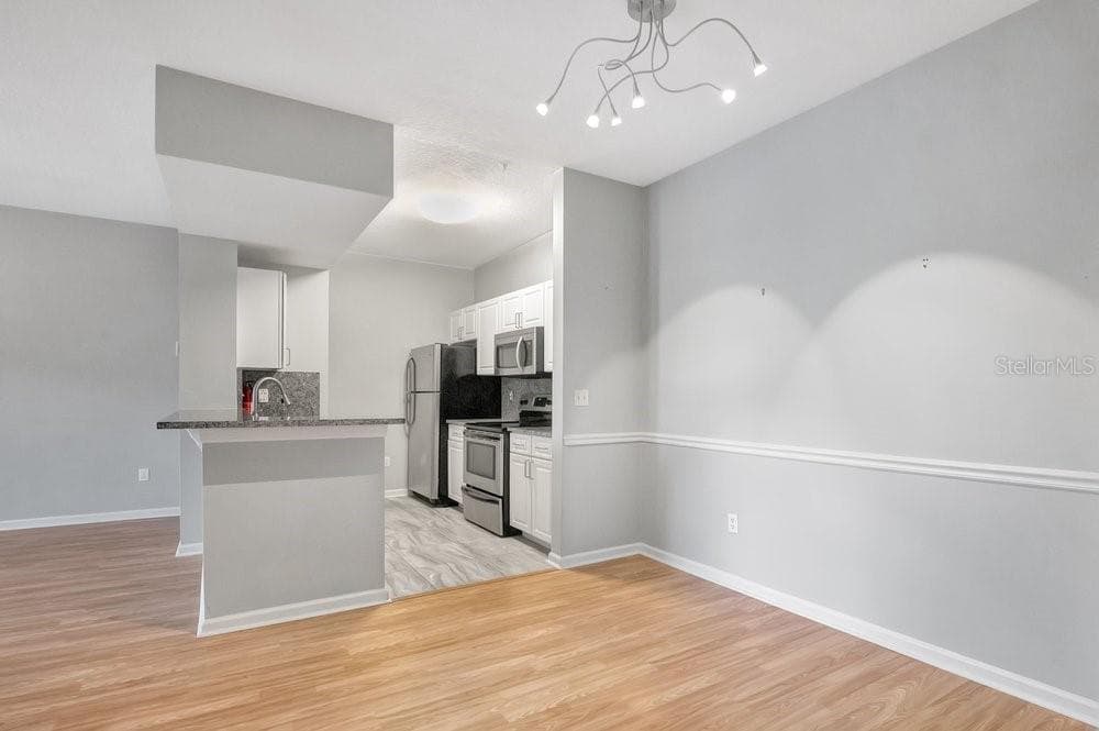 Dining into Kitchen - 14238 FREDRICKSBURG DR #304, ORLANDO