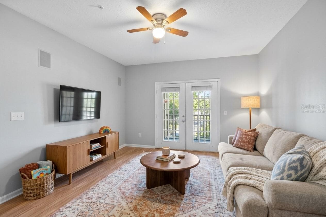 Living room (virtually Staged) - 14238 FREDRICKSBURG DR #304, ORLANDO