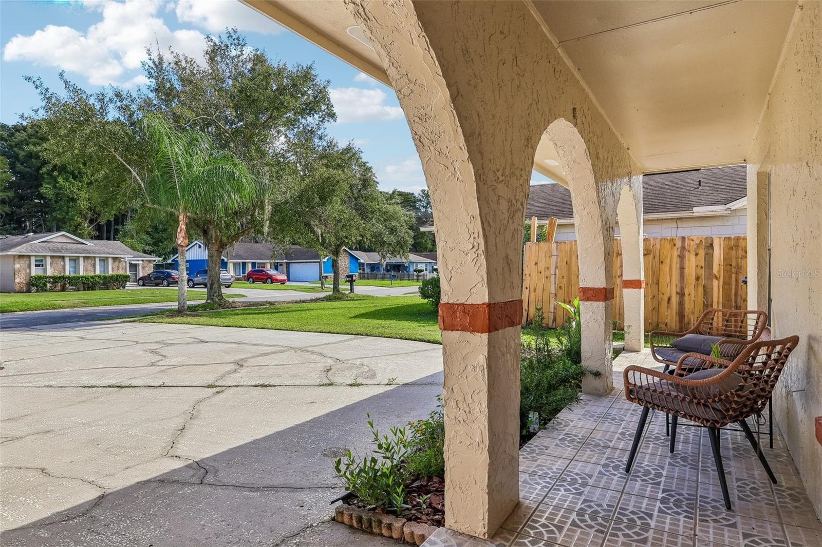 You'll enjoy sitting on your covered patio with beautiful tile accents - 1332 BOREAS DR, ORLANDO