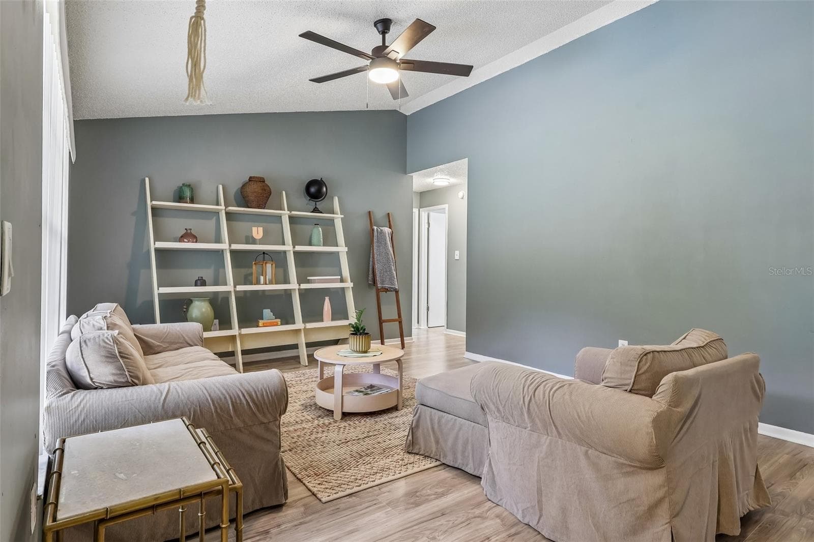 There is a nice wood-looking vinyl flooring throughout the entire house for a modern, fresh feel - 1332 BOREAS DR, ORLANDO