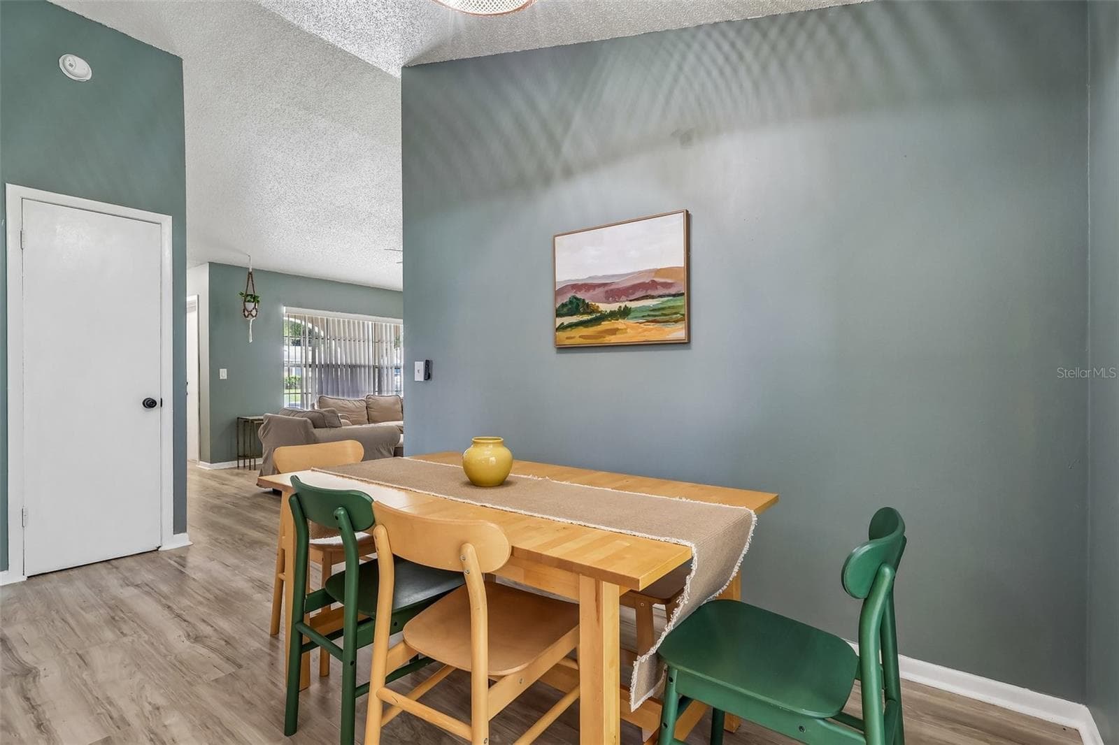 The dining area is off of the living room - 1332 BOREAS DR, ORLANDO