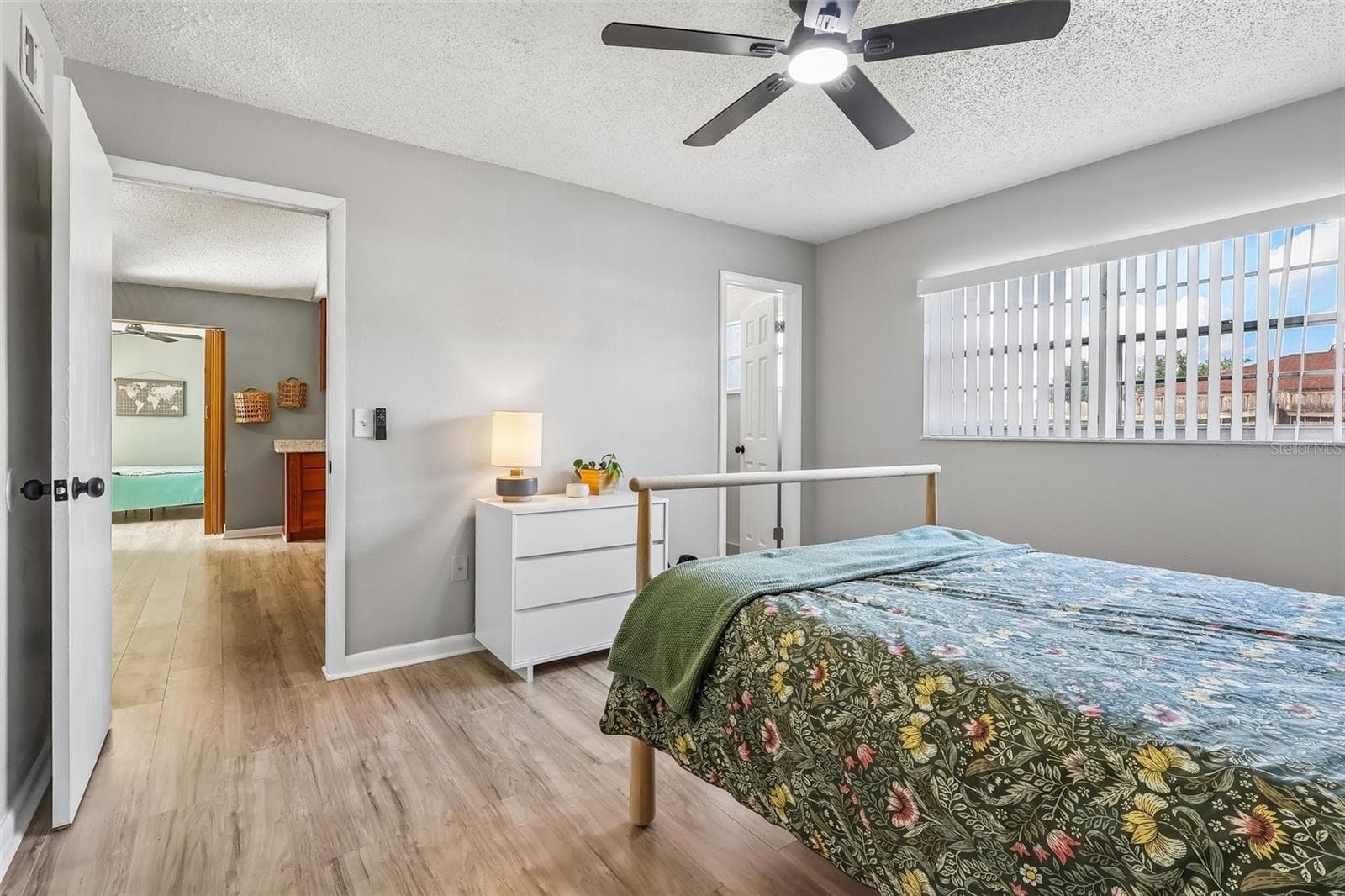 The primary suite has a large window and an en-suite bathroom - 1332 BOREAS DR, ORLANDO
