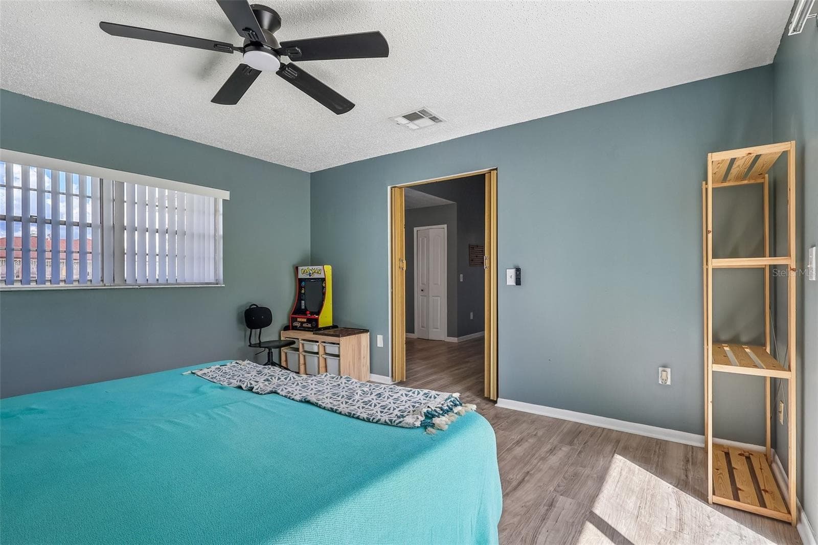 The bonus room also has a great window for natural light and a ceiling fan - 1332 BOREAS DR, ORLANDO