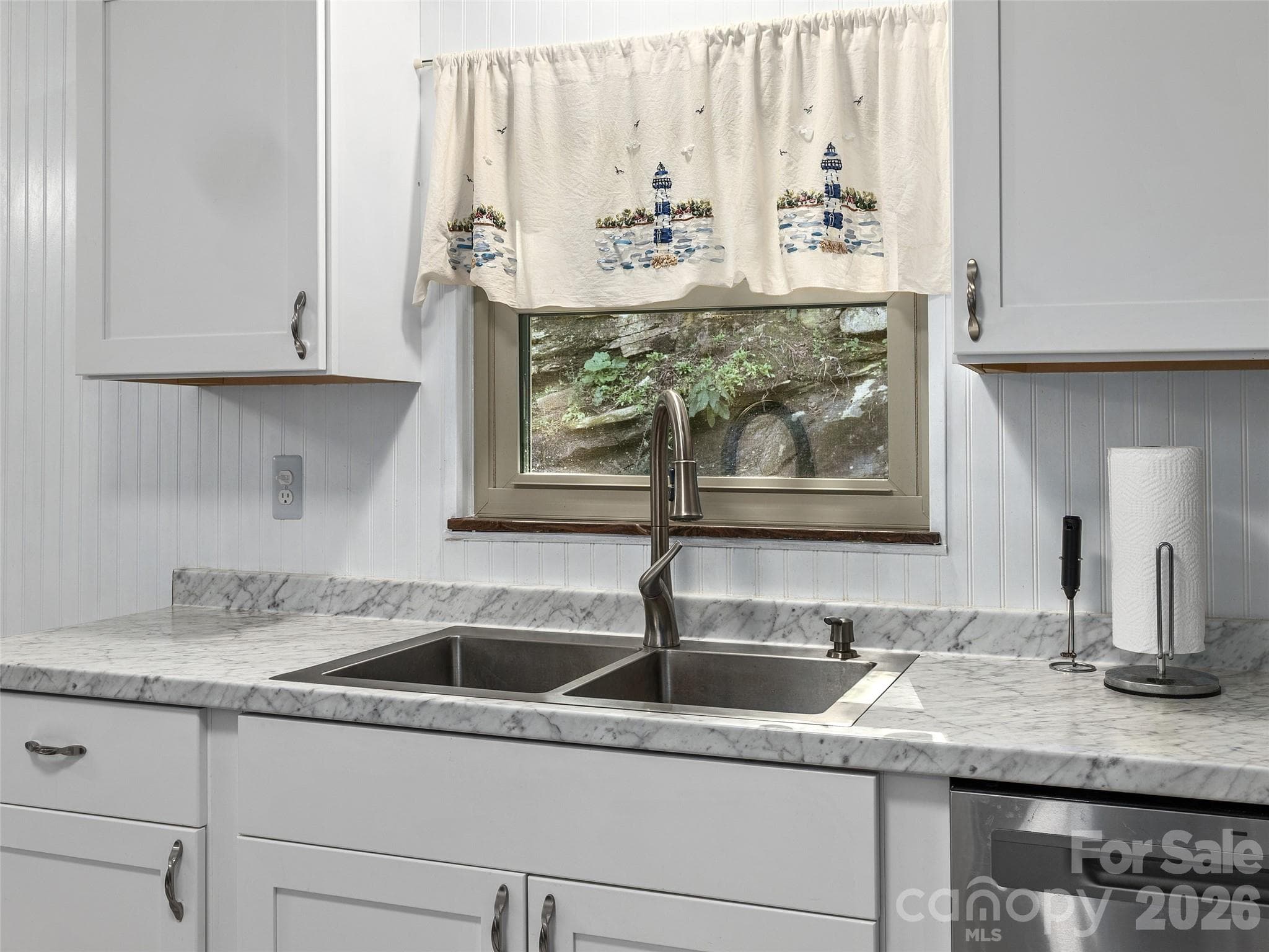 Large double sink with window that has great view out to the back yard. - 110 Shelly Drive, Hendersonville