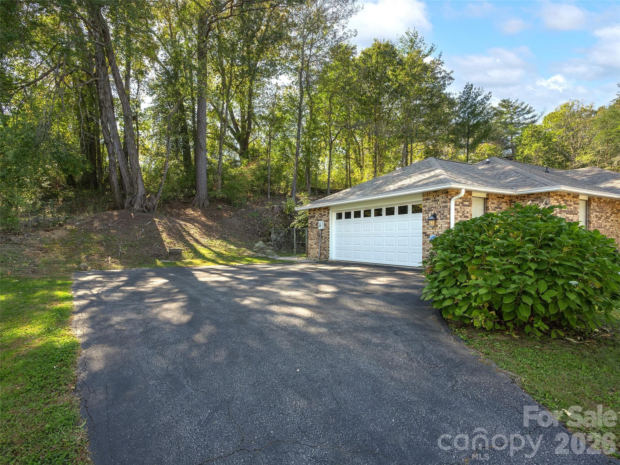Large paved driveway leading to the two car garage - 110 Shelly Drive, Hendersonville