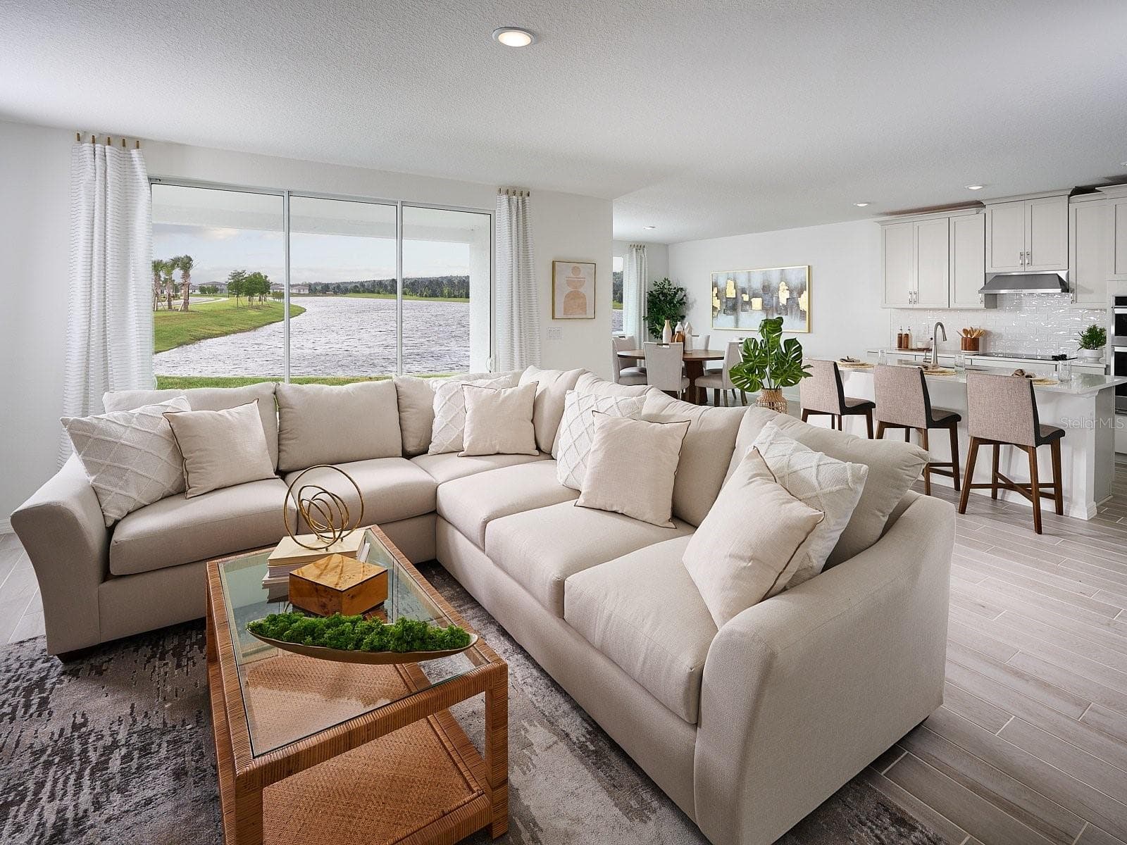 Discover the space and flexibility you've been searching for in Salt Meadows. This thoughtfully designed floorplan features four spacious bedrooms and three full baths, offering plenty of room for family, guests, or a private home office. At the heart of the home, the open-concept kitchen flows seamlessly into the dining area and great room, creating a welcoming environment perfect for entertaining and everyday living. Designed with both comfort and convenience in mind, this home offers versatile living spaces, a functional layout, and the ideal setting for making lasting memories with family and friends. - 3312 ORCHARD LOOP, BARTOW
