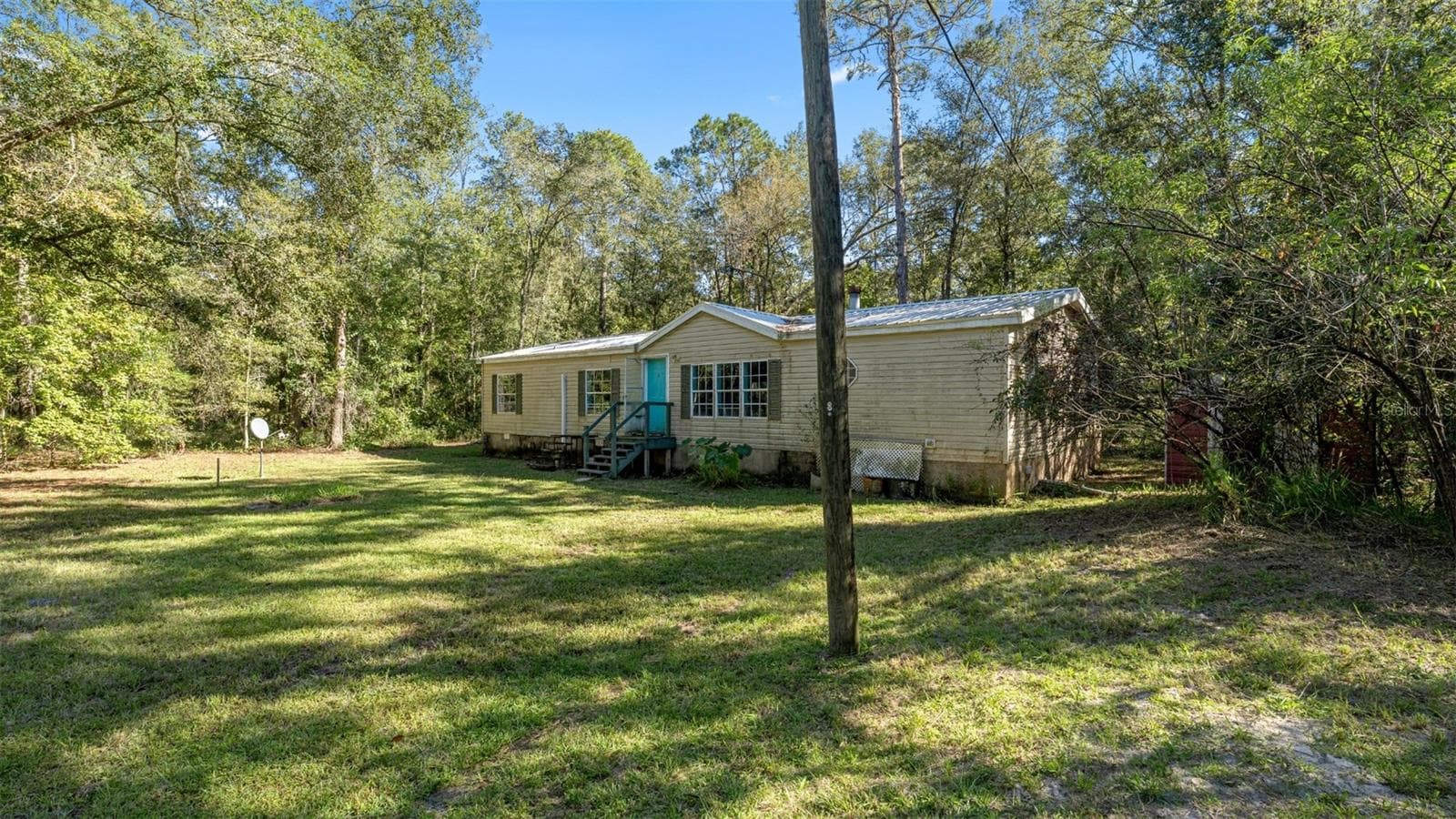 Manufactured Home at 4817 NW 244TH AVE, ALACHUA, photo 2 of 30
