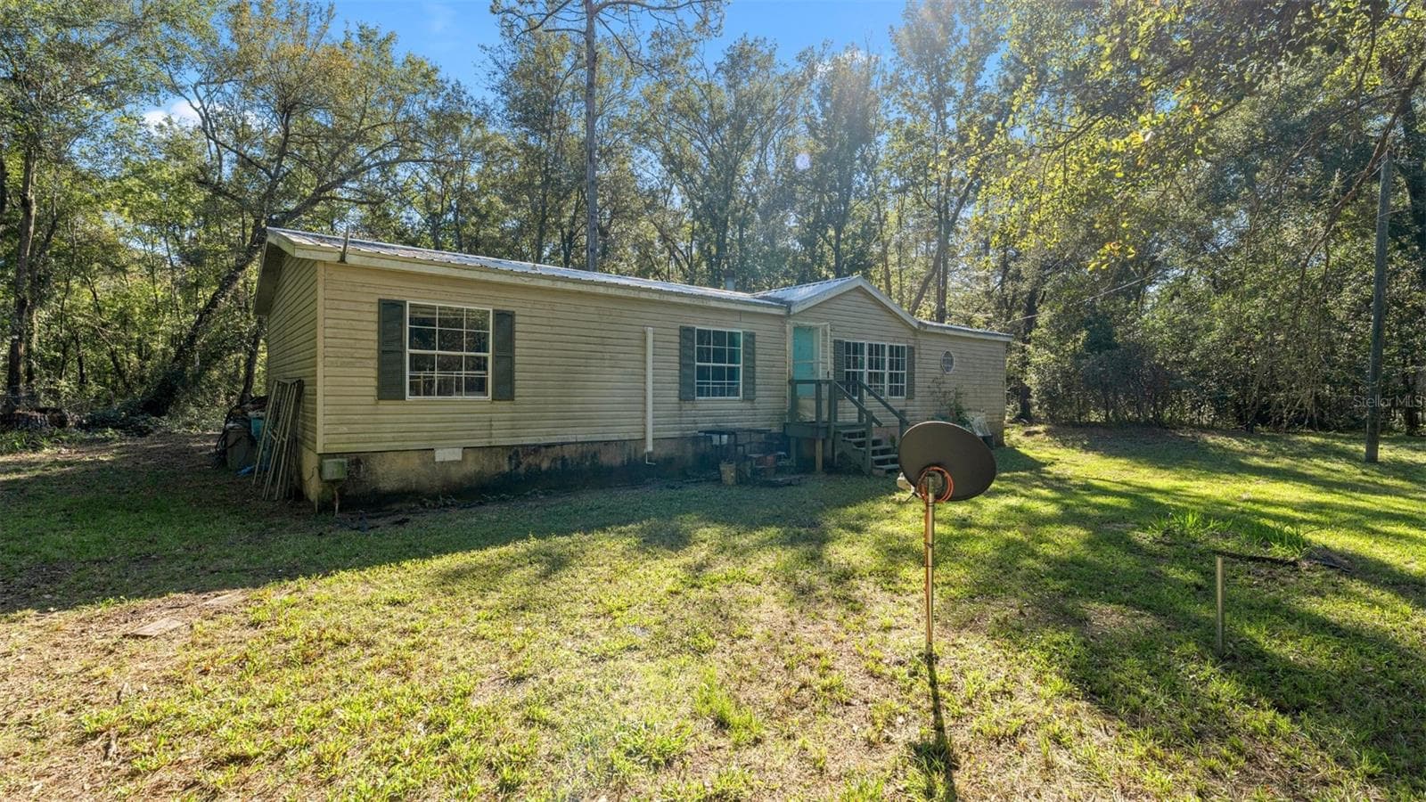 Manufactured Home at 4817 NW 244TH AVE, ALACHUA, photo 4 of 30