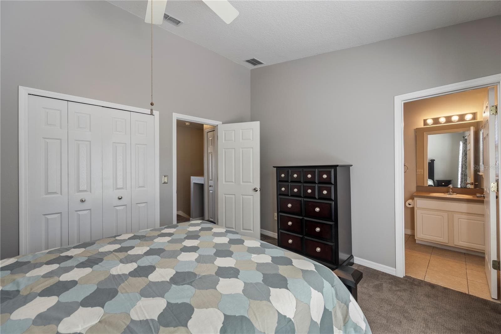 Bedroom 2 with ensuite bathroom - 8516 DANFORTH DR, WINDERMERE