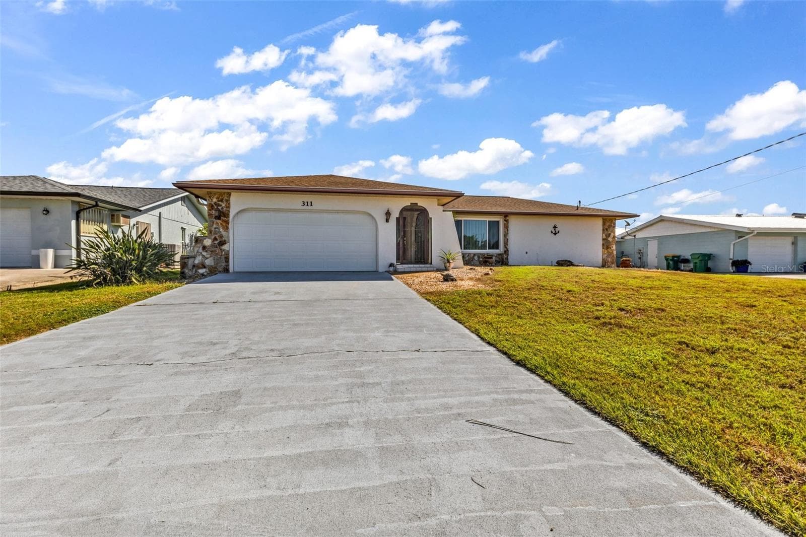 311 W TARPON BLVD NW