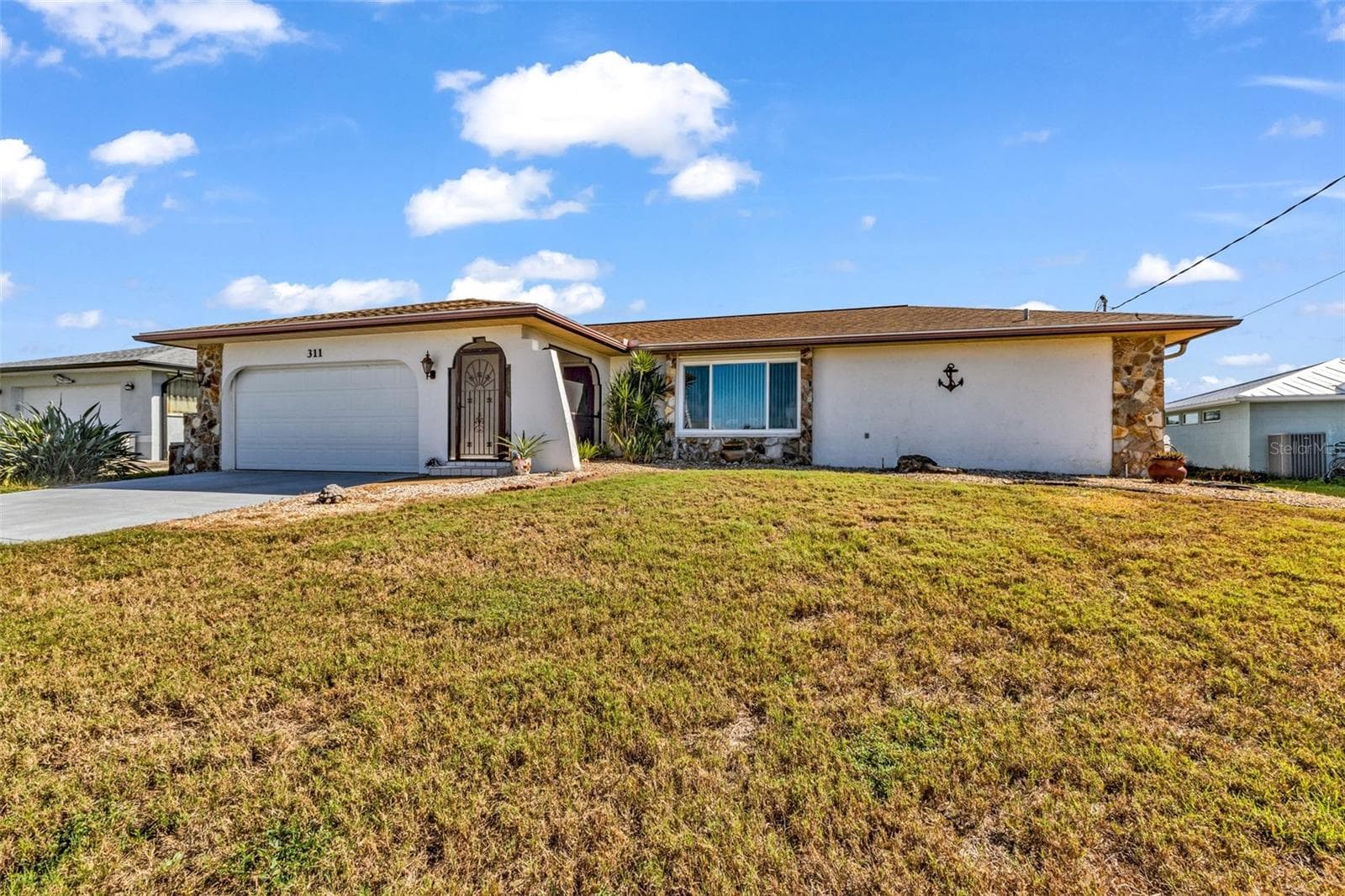 Single Family Residence at 311 W TARPON BLVD NW, PORT CHARLOTTE, photo 54 of 70