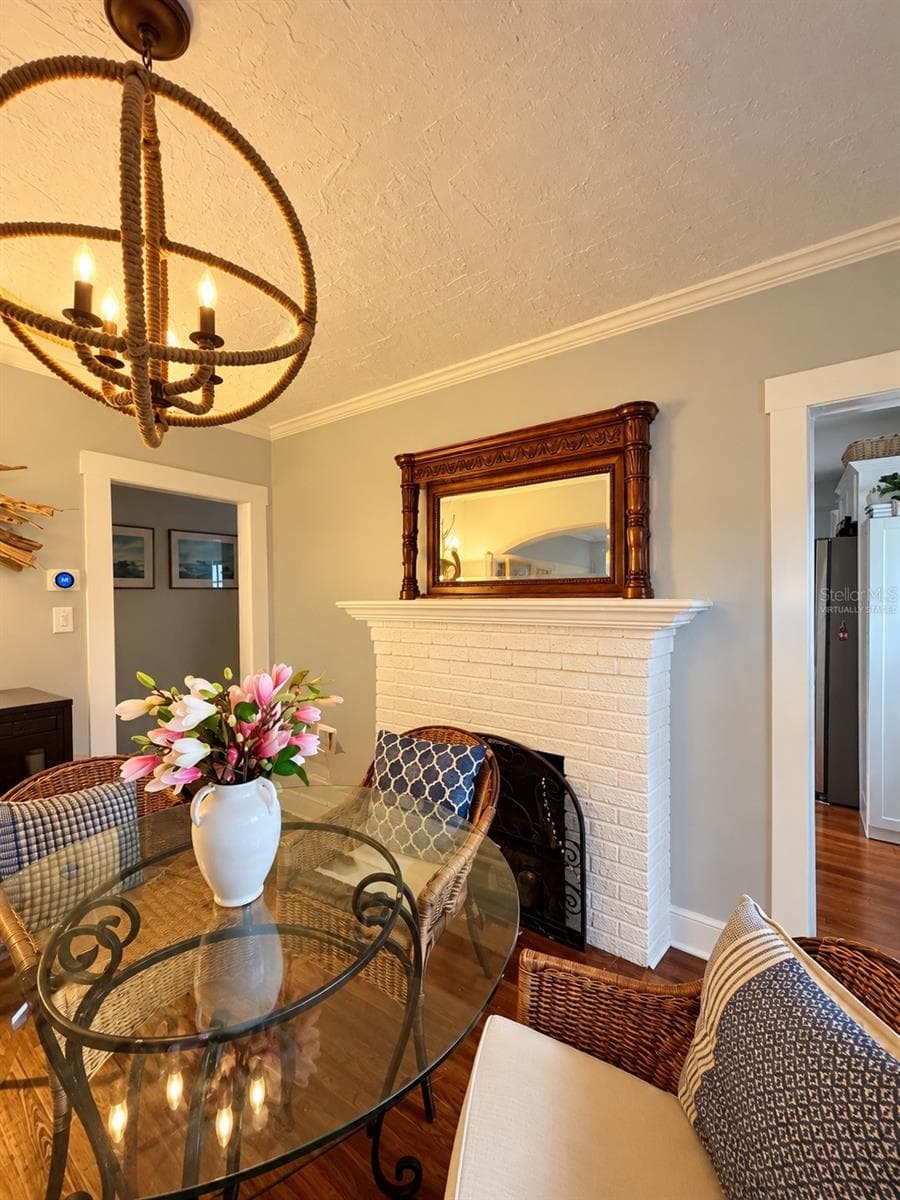 Dining / Fireplace - Virtually Staged - 1777 ALTA VISTA ST, SARASOTA