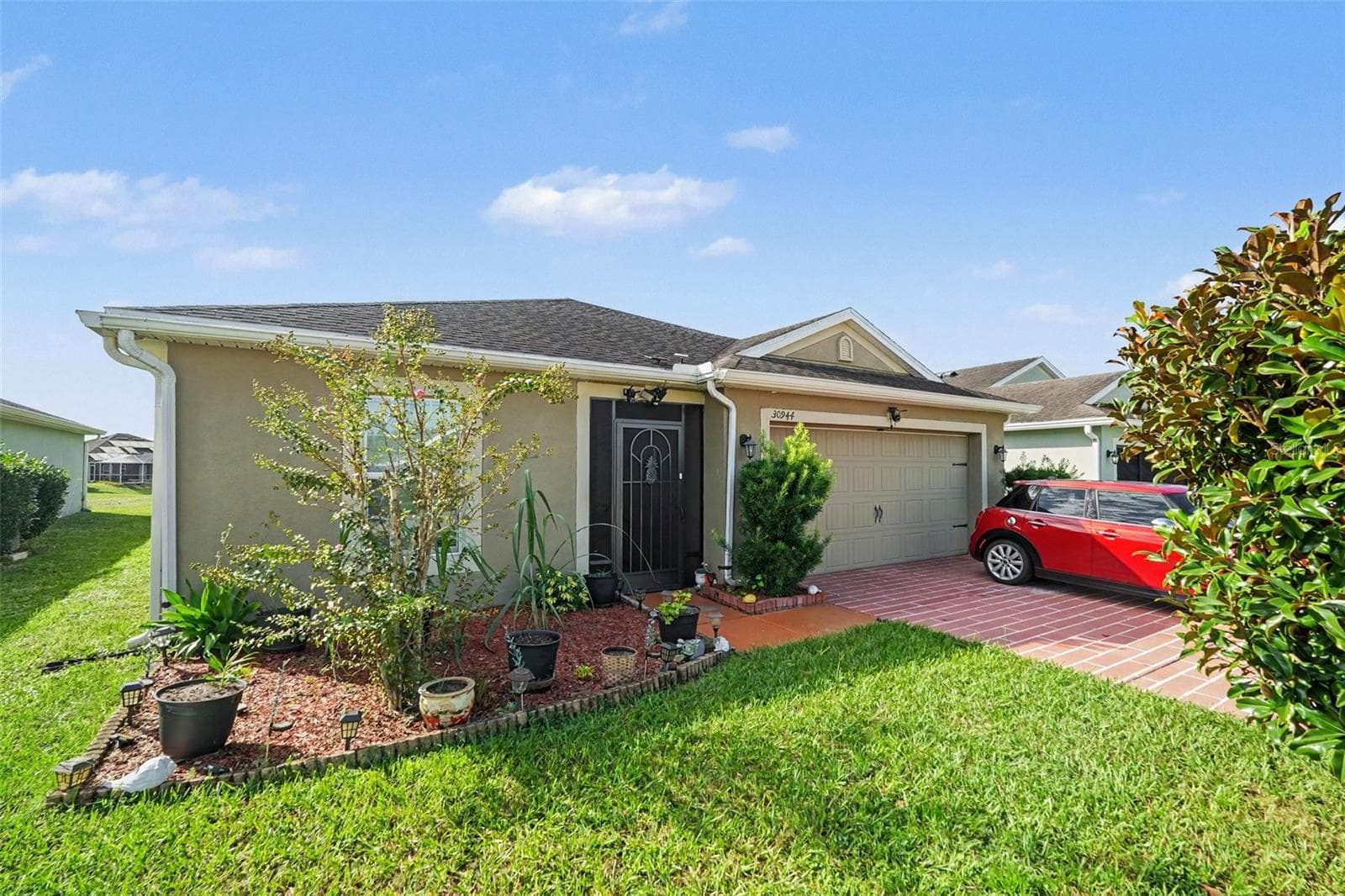 Single Family Residence at 30944 WATER LILY DR, BROOKSVILLE, photo 3 of 15