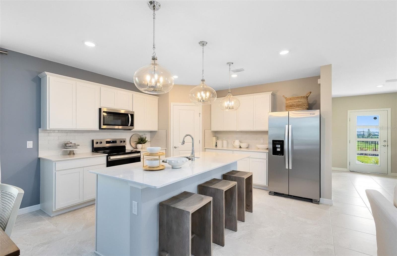 Actual home photo. Colors, finishes, textures and options may appear differently in person due to variations in monitors and viewing devices. - 5064 OAK SEED WAY, ST CLOUD