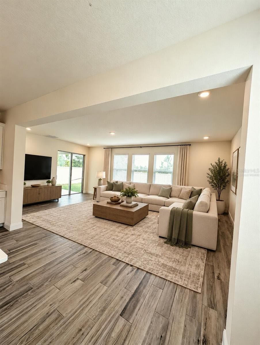 Family Room Virtually Staged - 952 VINEYARD RIDGE RD, MINNEOLA