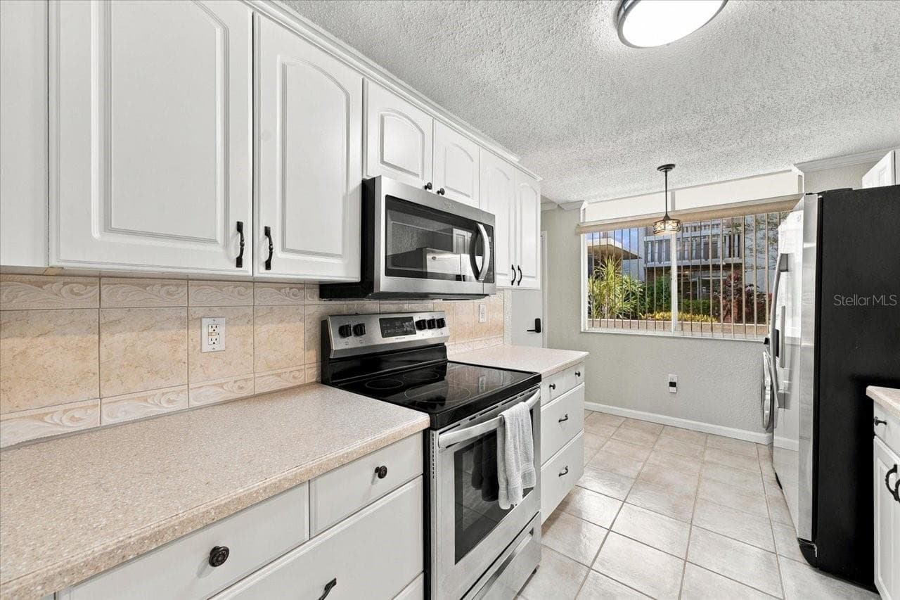 Condominium at 1001 PEARCE DR #111, CLEARWATER, photo 11 of 52