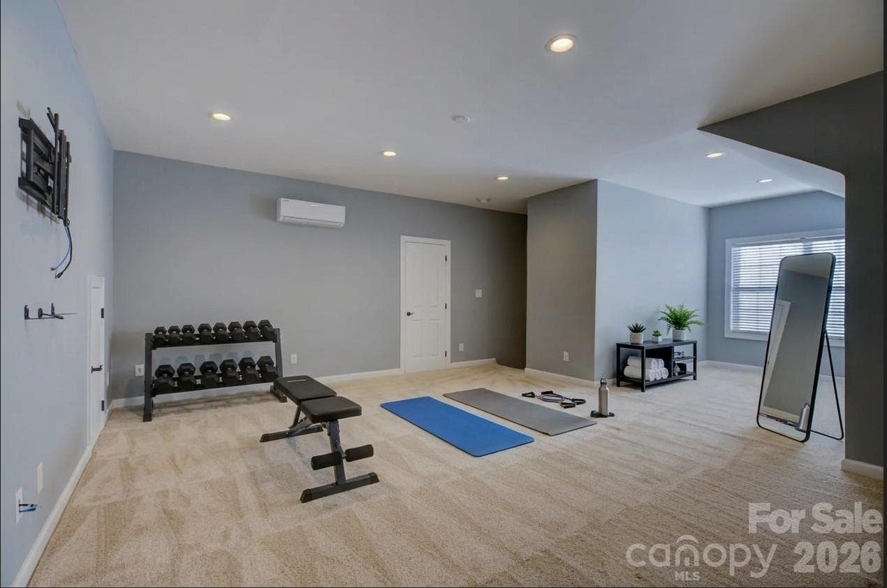 Virtually staged gym on the 3rd floor - 13700 Glen Abbey Drive, Charlotte