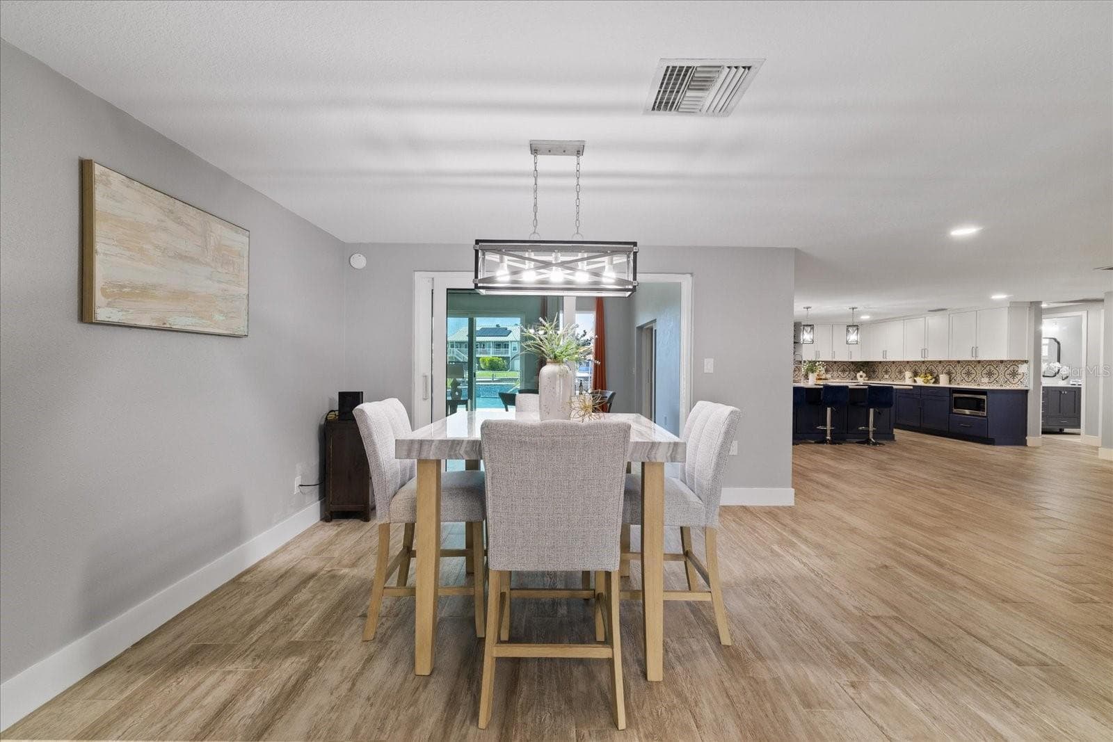 Dining area with open plan - 5001 MARLIN DR, NEW PORT RICHEY