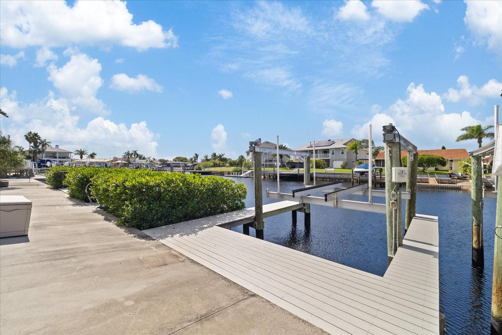 13,000 lb boat lift and plank dock - 5001 MARLIN DR, NEW PORT RICHEY