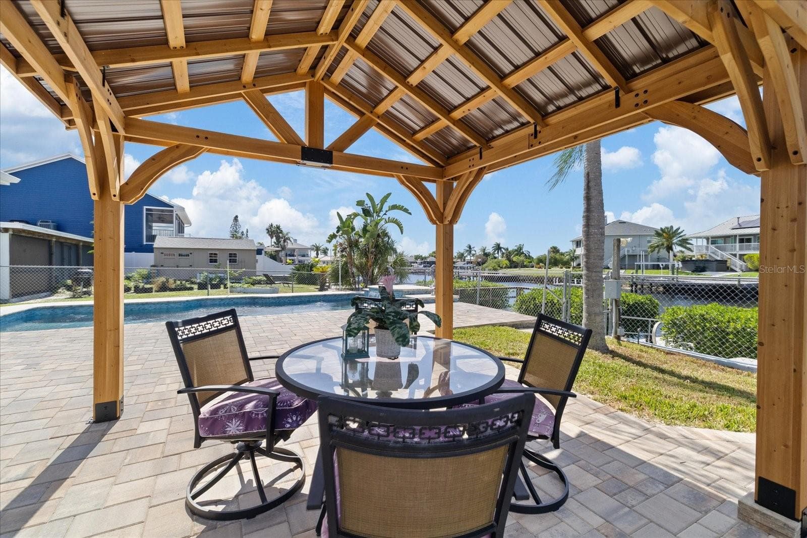 Gazebo shaded area on pavered pool deck - 5001 MARLIN DR, NEW PORT RICHEY