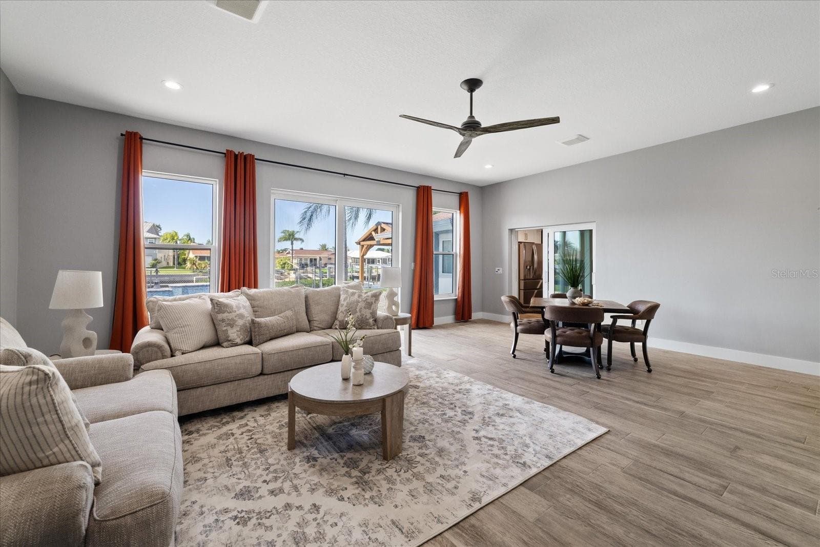 Family room with pool views - 5001 MARLIN DR, NEW PORT RICHEY