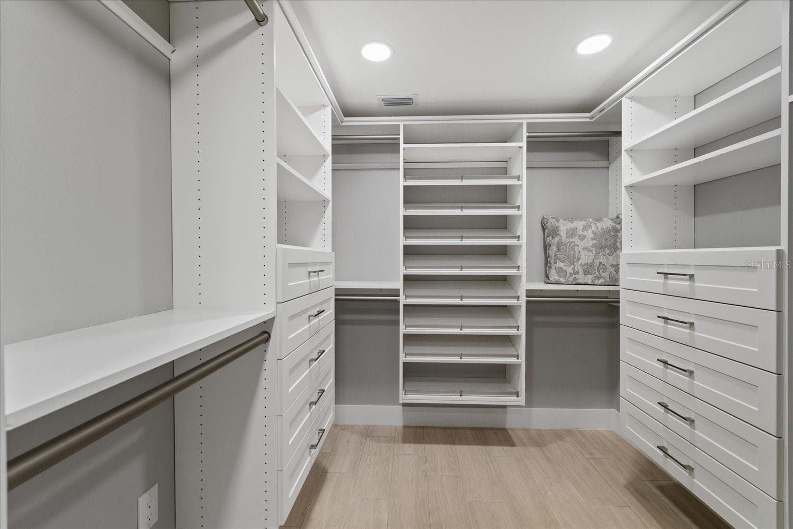 Walk in custom closet in primary full view - 5001 MARLIN DR, NEW PORT RICHEY