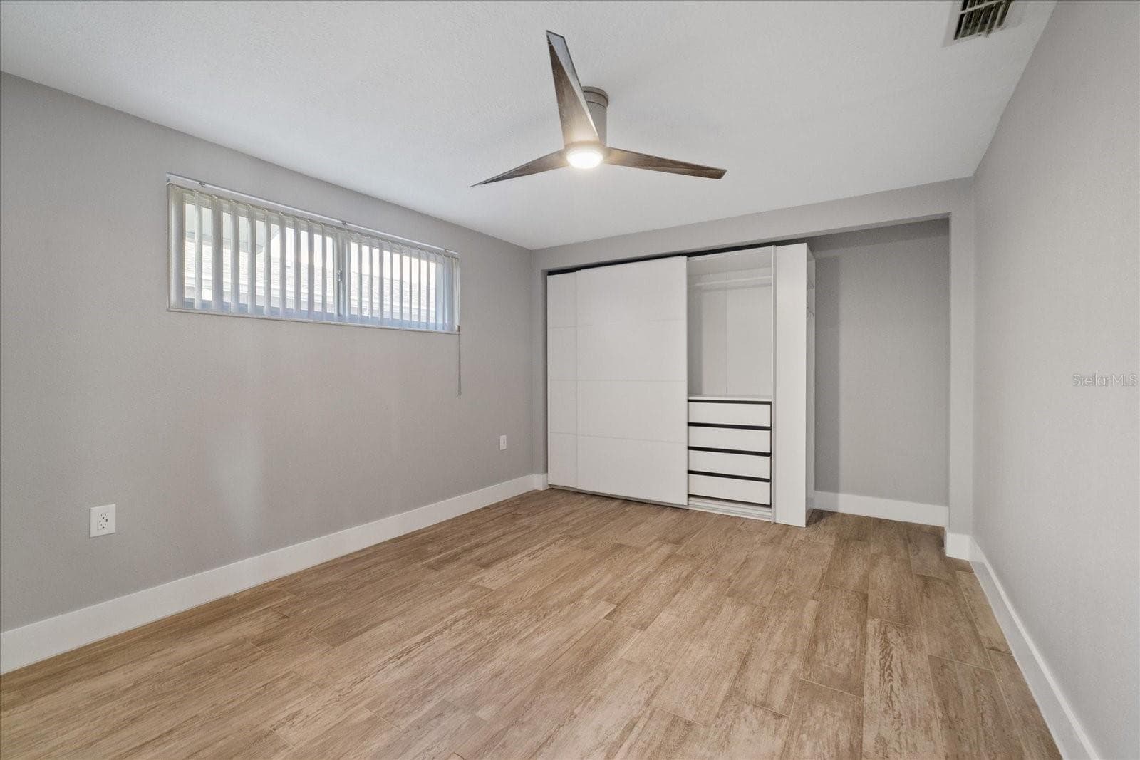 2nd bedroom showing closet unit - 5001 MARLIN DR, NEW PORT RICHEY