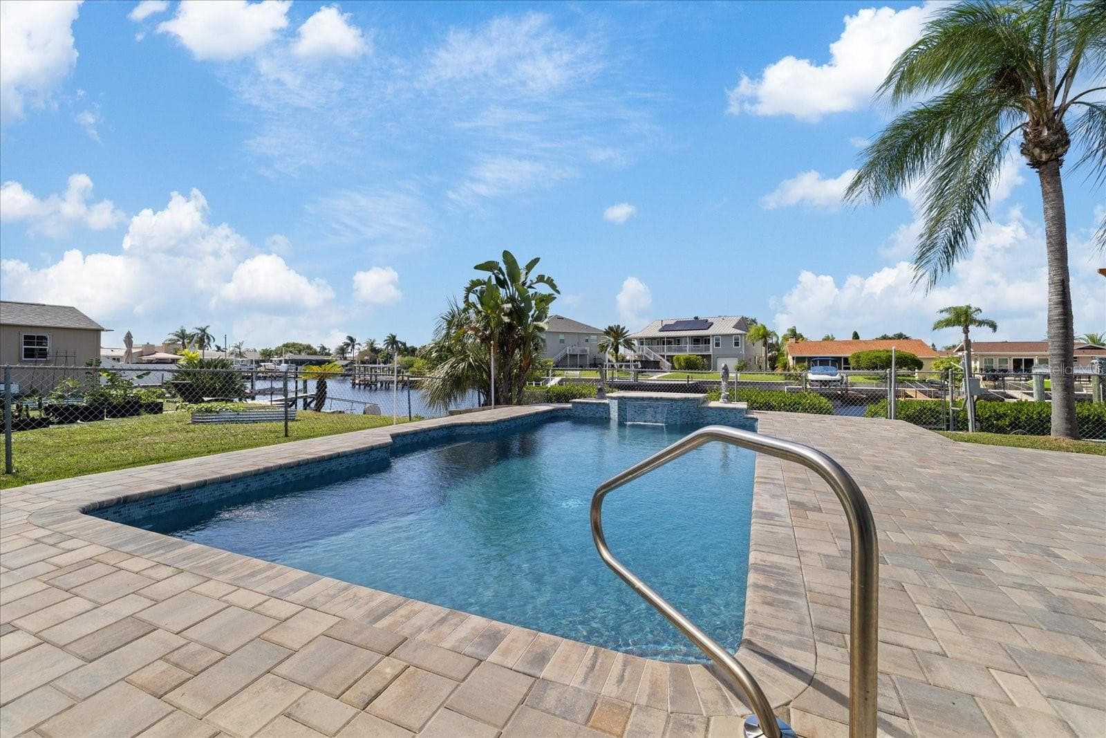 Newly refinished pool and pavered deck. - 5001 MARLIN DR, NEW PORT RICHEY