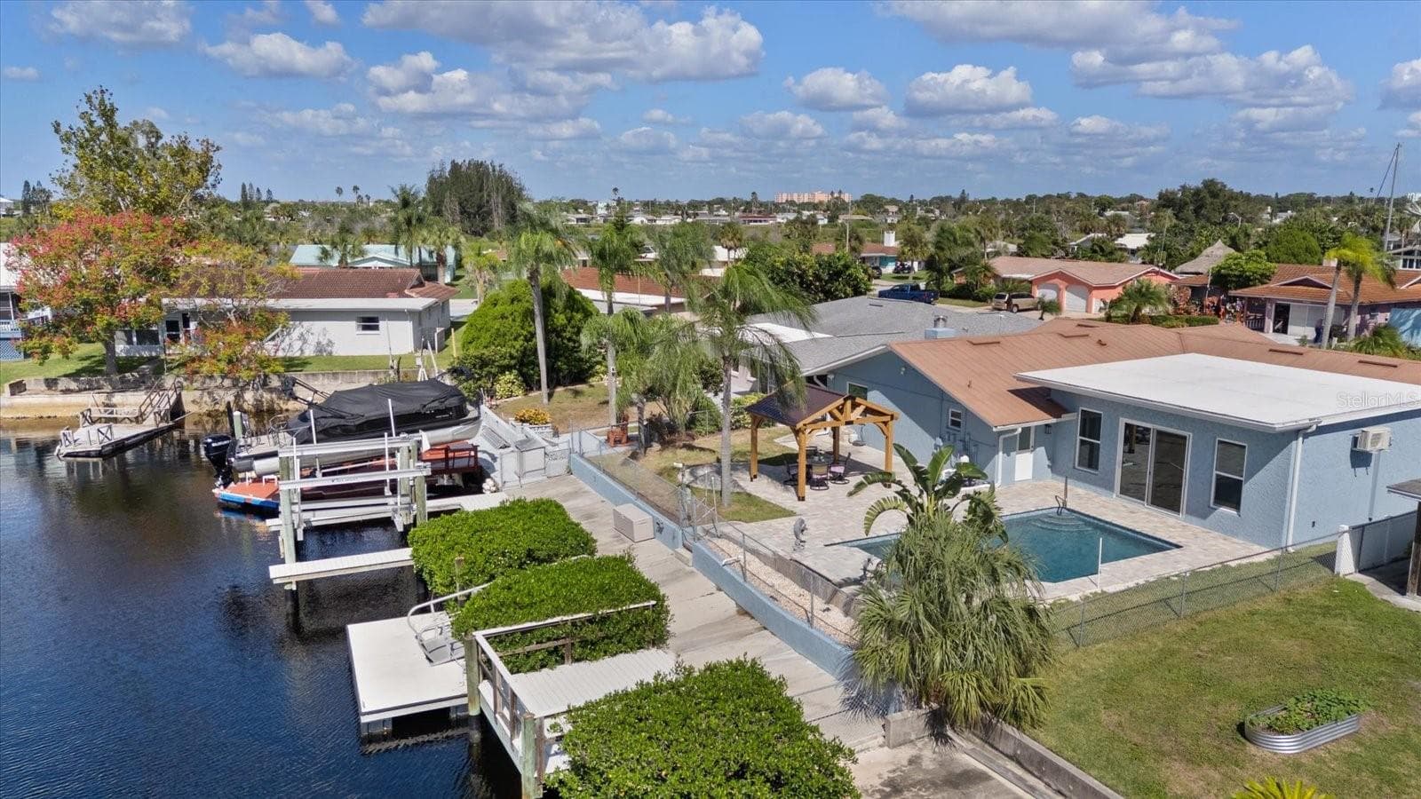 view looking north along docks, boat lift and mangroves - 5001 MARLIN DR, NEW PORT RICHEY