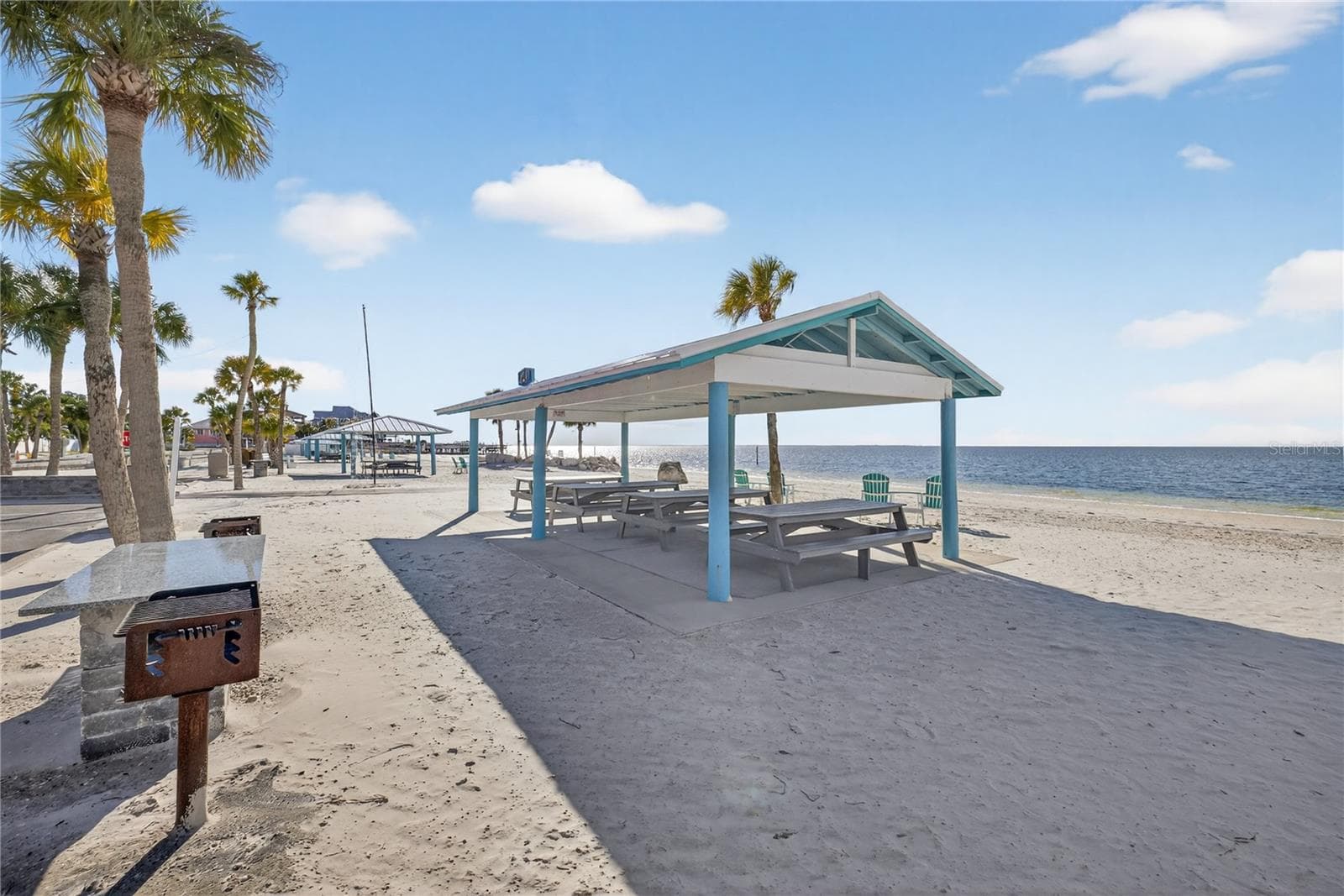 BBQ grills,  picnic tables and cabanas at beach club - 5001 MARLIN DR, NEW PORT RICHEY