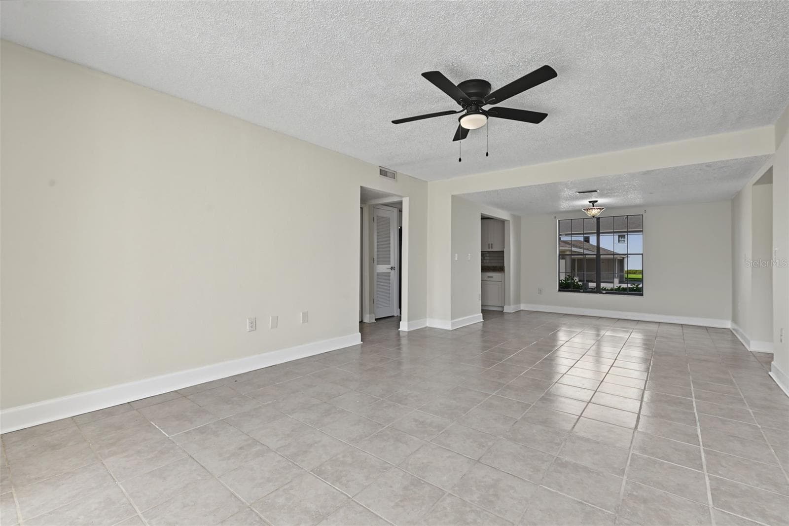 Living Room/Dining Area - 2460 HERON TER #102E, CLEARWATER