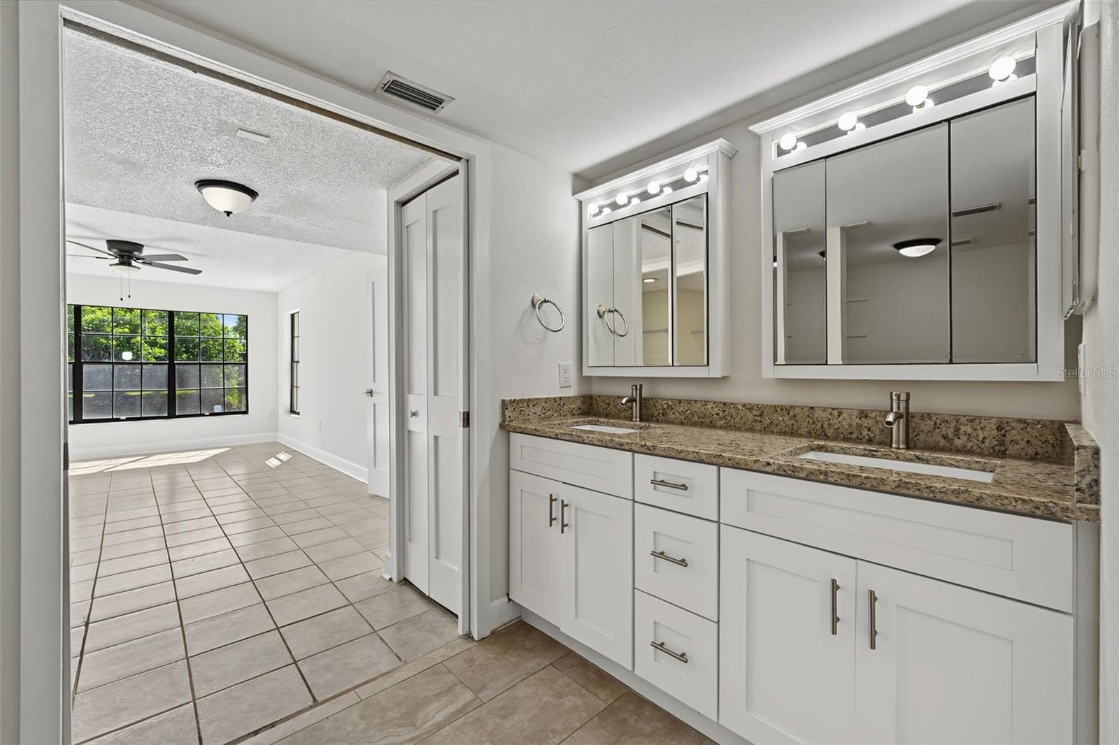 Updated Primary En Suite Bathroom - 2460 HERON TER #102E, CLEARWATER