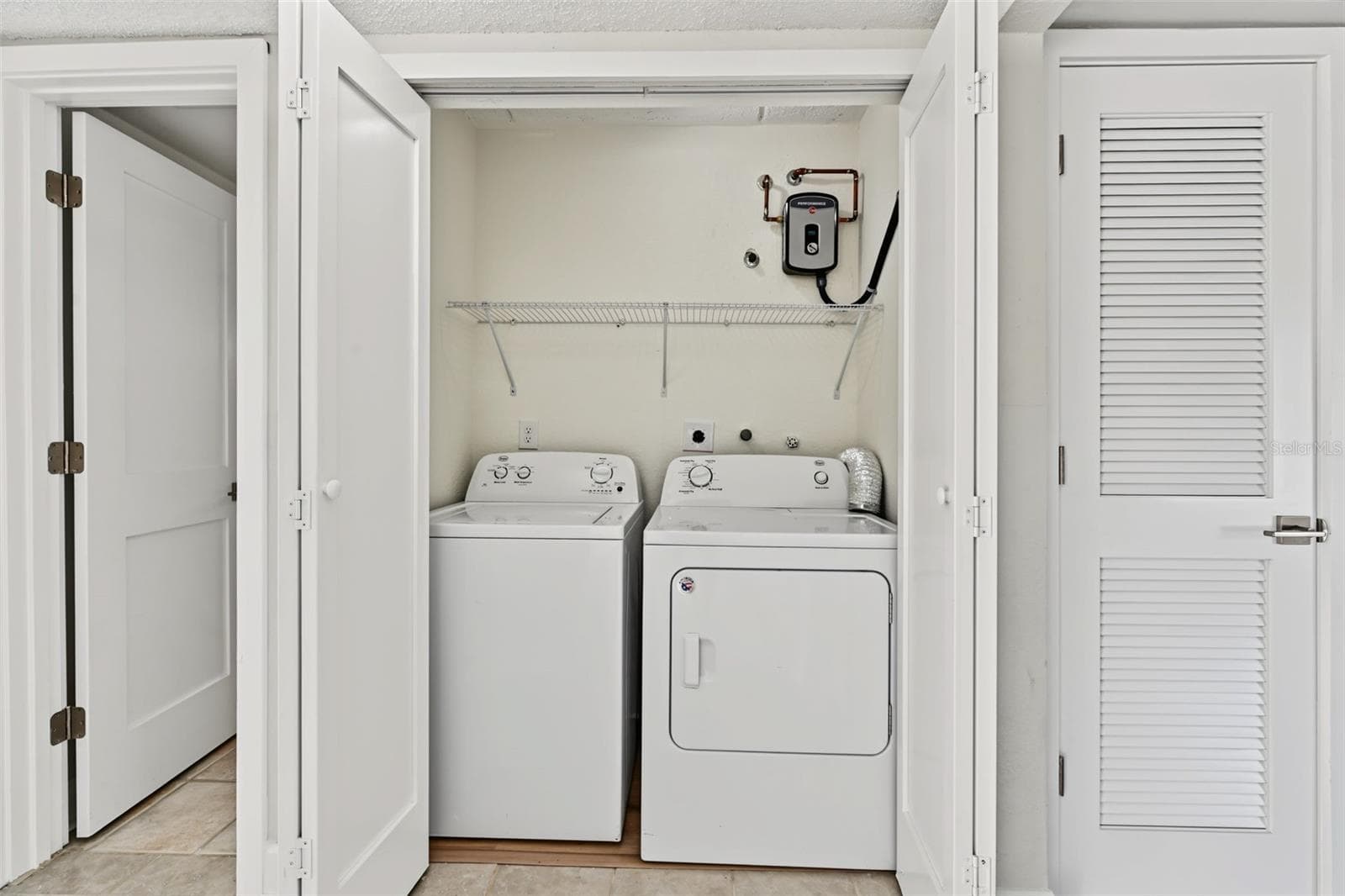Inside Laundry Closet - 2460 HERON TER #102E, CLEARWATER