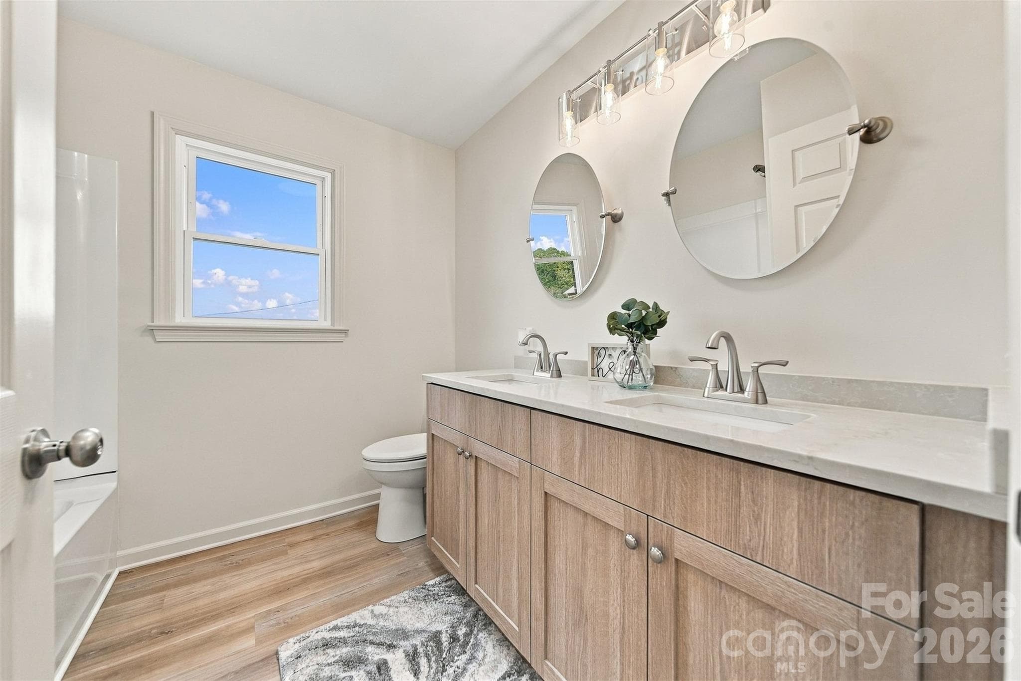 Hall bathroom with a double vanity! - 4176 Grace Chapel Road, Granite Falls