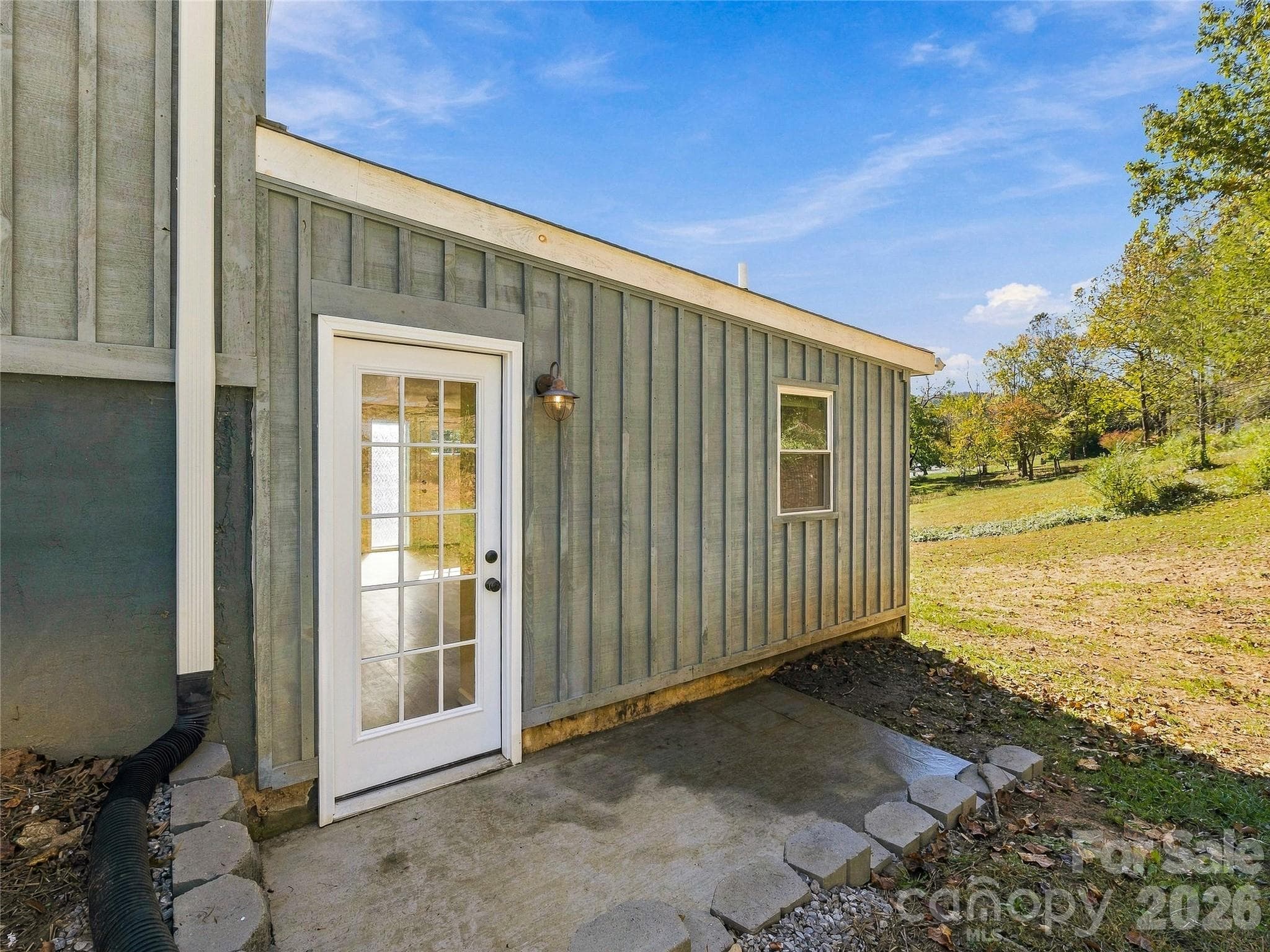 apartment patio and rear door - 33 Phipps Street, Weaverville