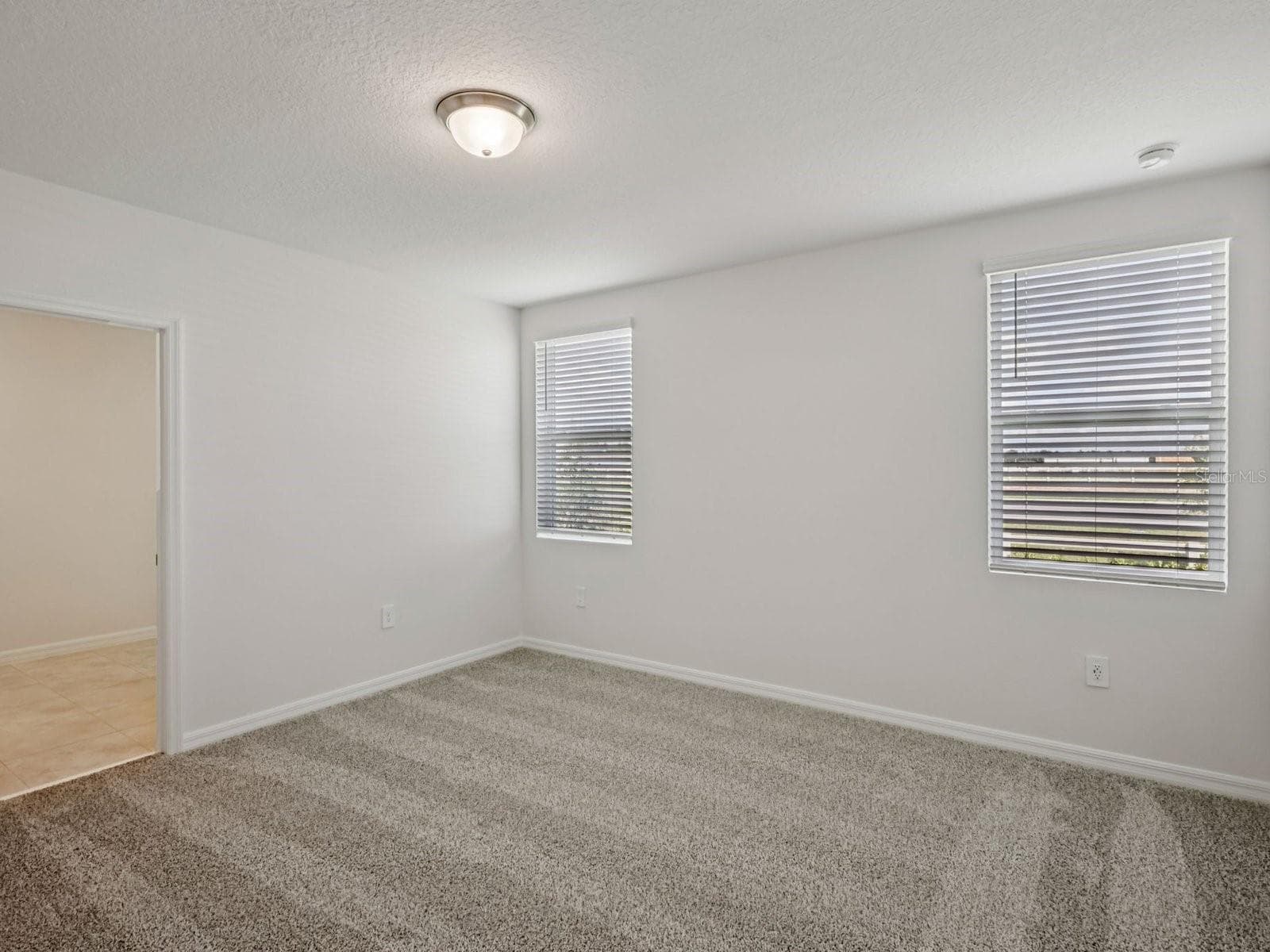 Can you make this description for VillaMar for MLS with a warm but sales appeal: This versatile floorplan offers four bedrooms, two full baths and family room, complemented by an open-concept kitchen, dining area, and great room designed for gathering and entertaining. - 3965 GIORGIO DR, WINTER HAVEN