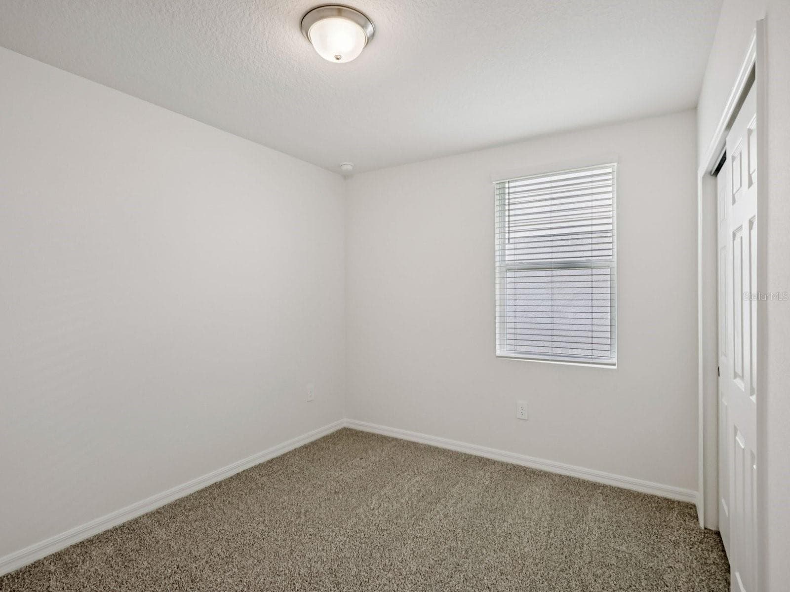 Can you make this description for VillaMar for MLS with a warm but sales appeal: This versatile floorplan offers four bedrooms, two full baths and family room, complemented by an open-concept kitchen, dining area, and great room designed for gathering and entertaining. - 3965 GIORGIO DR, WINTER HAVEN