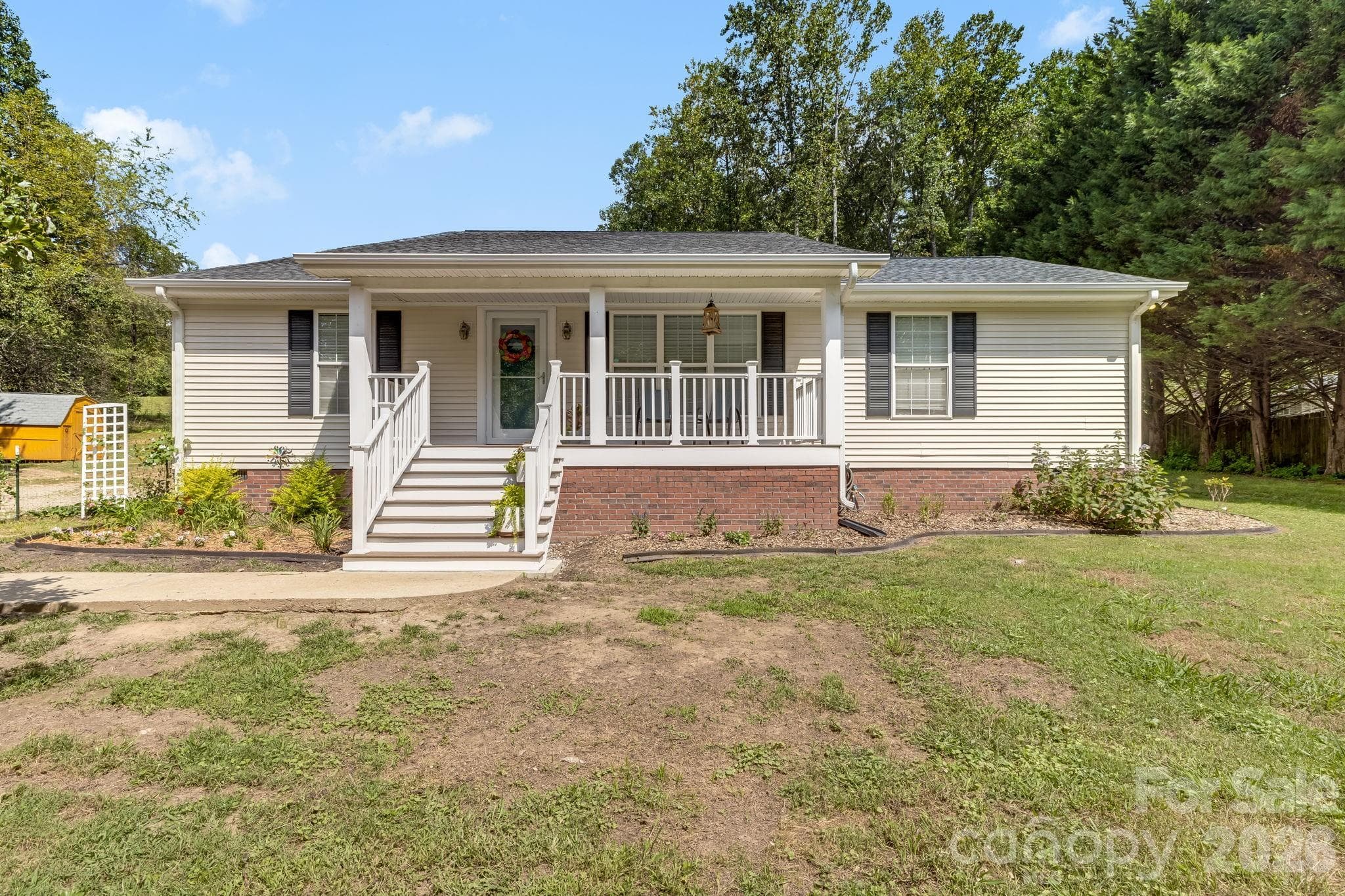 Tucked back from the road, with room to spread out and make yourself at home. - 710 Stoney Mountain Road, Hendersonville